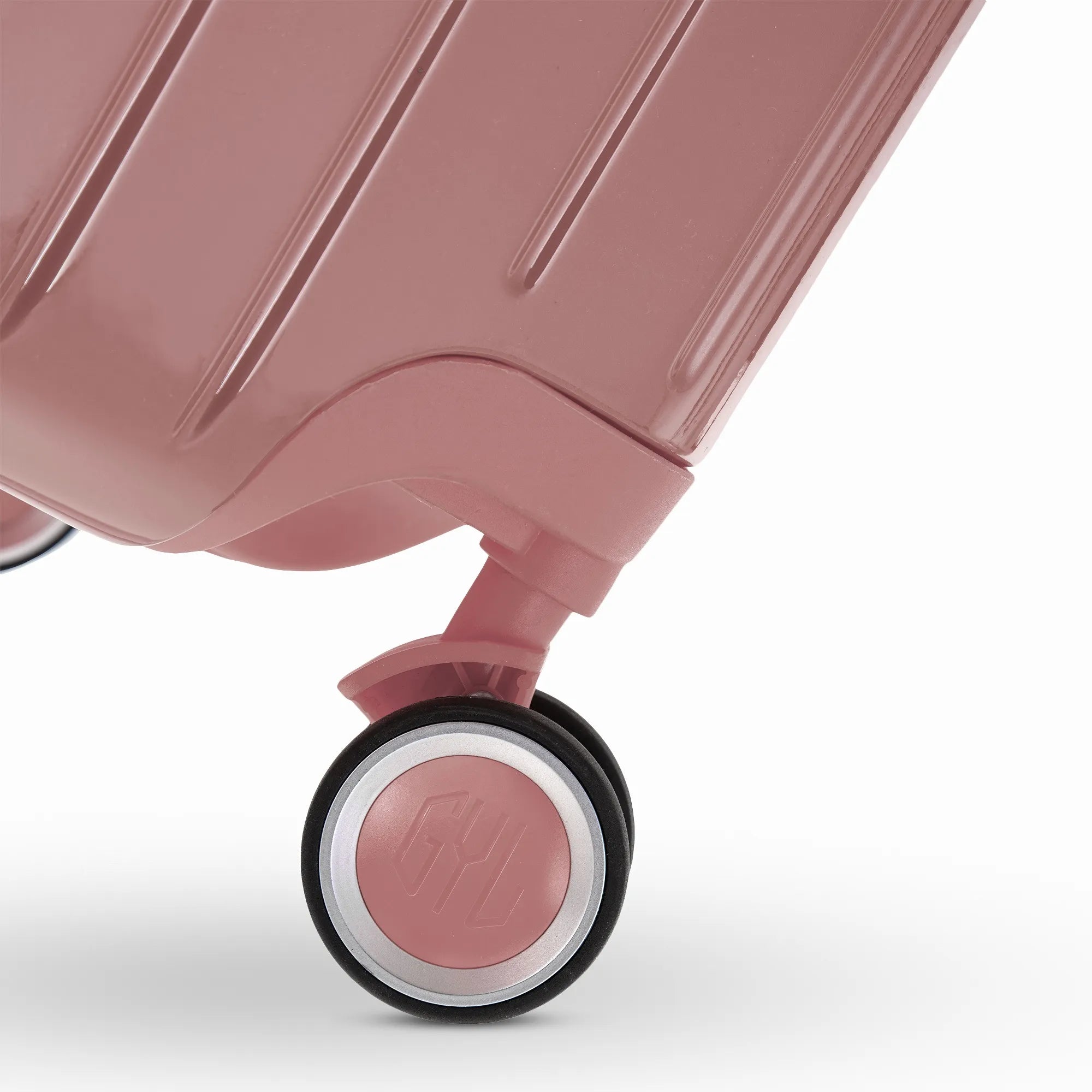 Roue double 360° de la valise GYL Intemporelle rose gold avec gravure du logo GYL sur le moyeu.