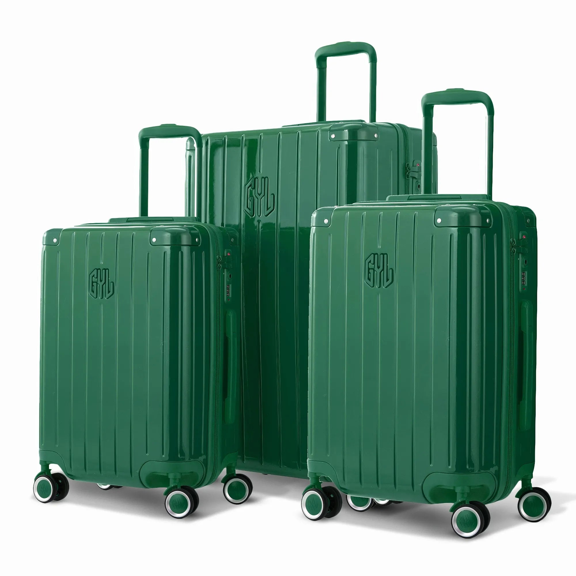 Trio de valises rigides GYL Intemporelle sapin avec coques nervurées et poignées télescopiques. #couleur_sapin