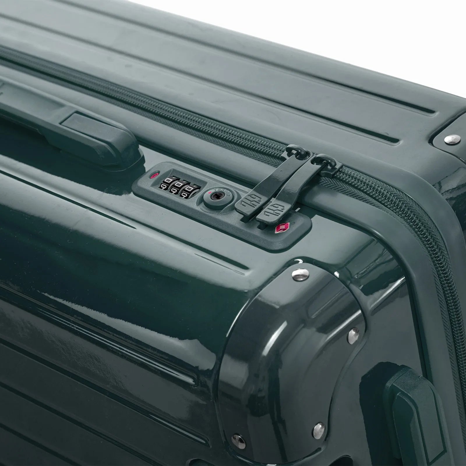 Fermeture à combinaison TSA et double curseur zippé GYL sur la valise rigide gris foncé Intemporelle.