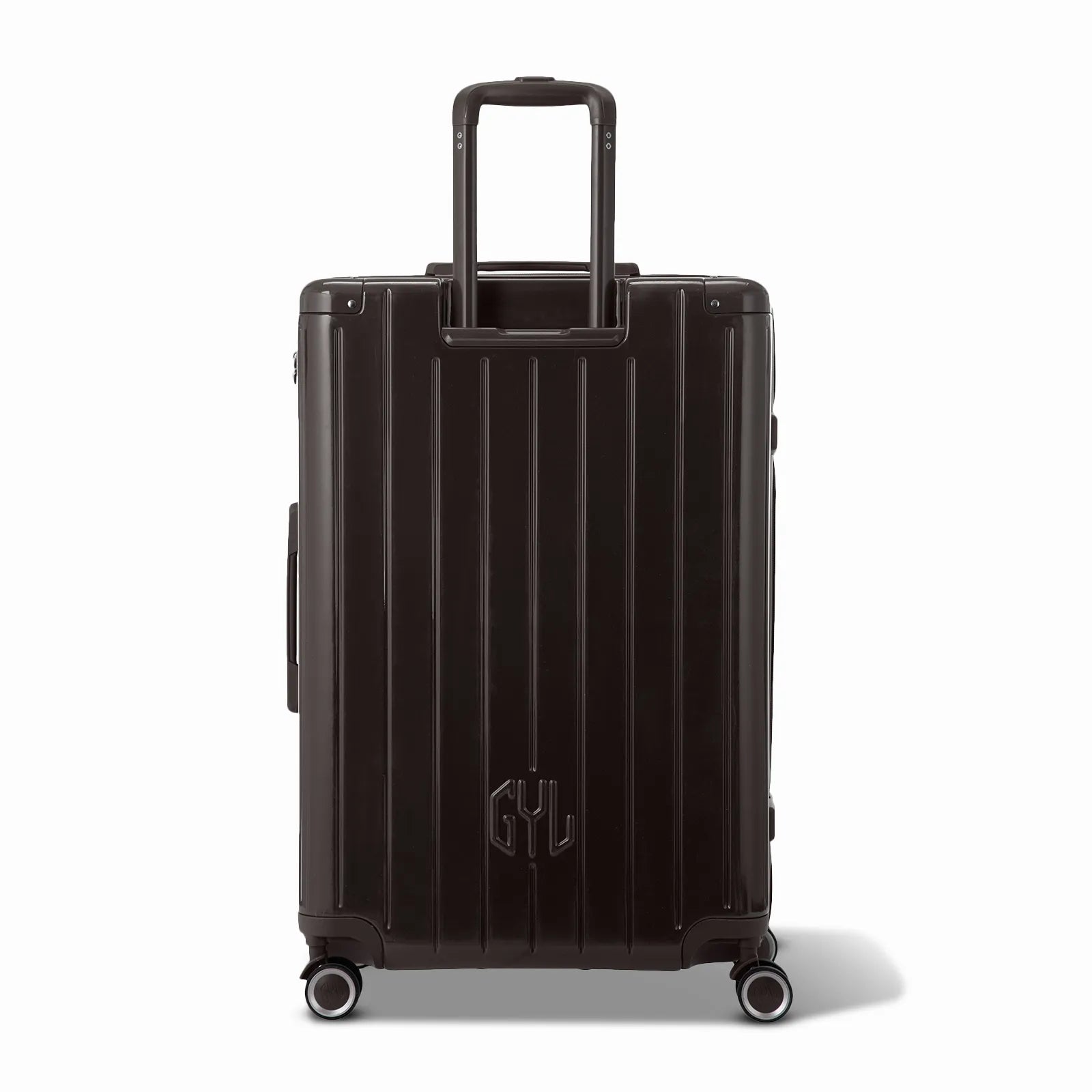 Vue arrière de la valise rigide GYL Intemporelle noir avec poignées intégrées et roulettes pivotantes.