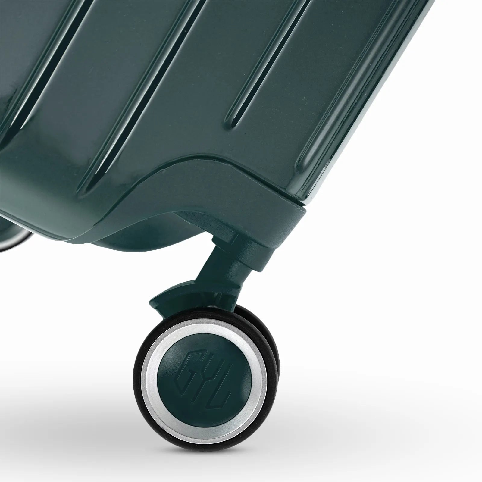Roue double 360° de la valise GYL Intemporelle gris foncé avec gravure du logo GYL sur le moyeu.