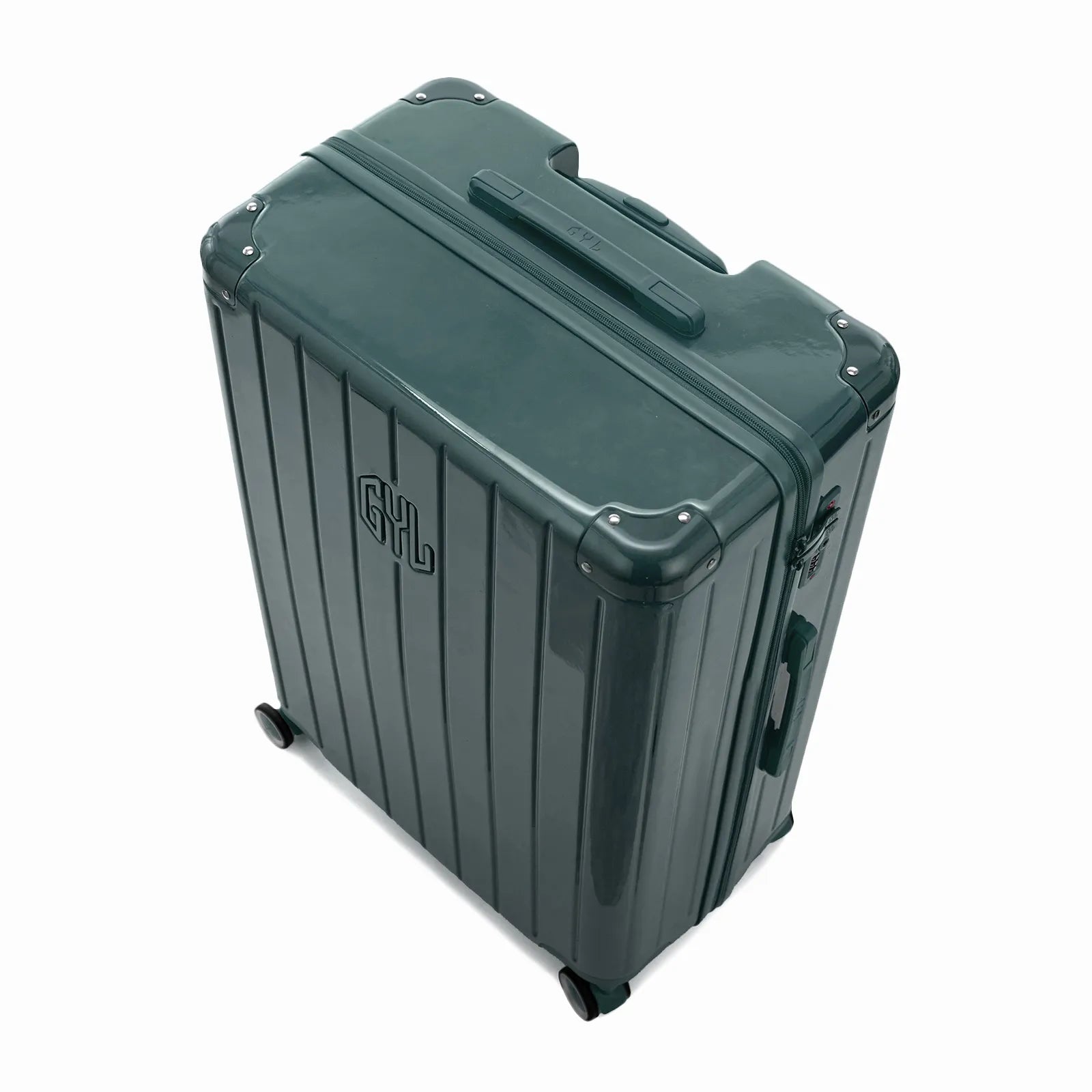 Vue en angle de la valise rigide GYL Intemporelle gris foncé avec coins renforcés et coque nervurée brillante.