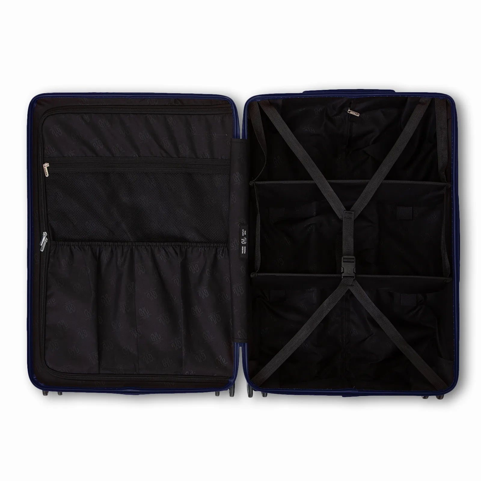 Intérieur compartimenté de la valise GYL Intemporelle marine avec sangles croisées et poches filet.
