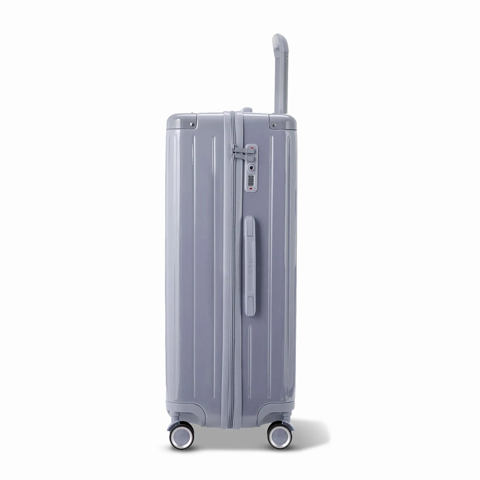 Vue latérale de la valise rigide GYL Intemporelle argent avec poignée télescopique et fermeture TSA.