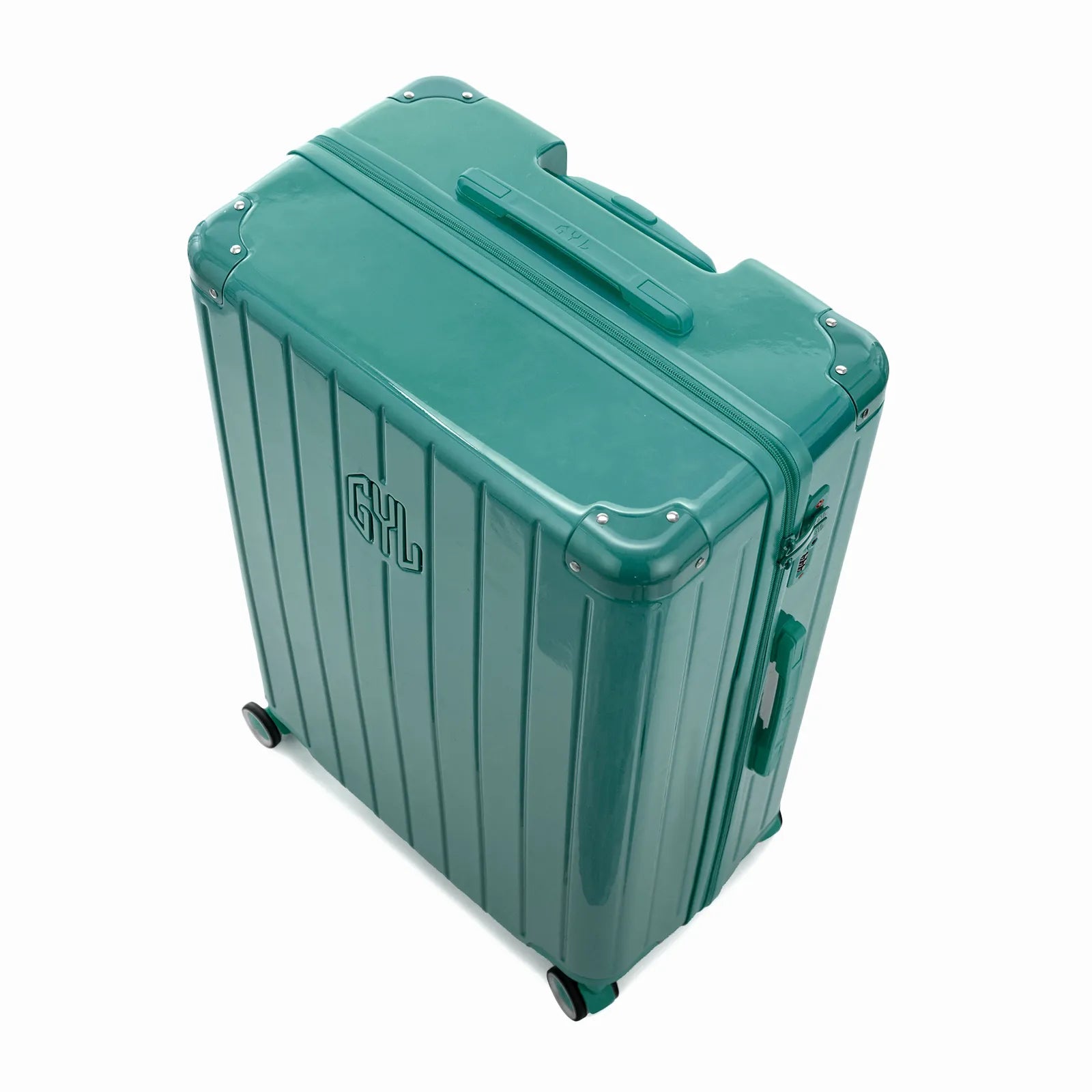 Vue en angle de la valise rigide GYL Intemporelle vert d'eau avec coins renforcés et coque nervurée brillante.