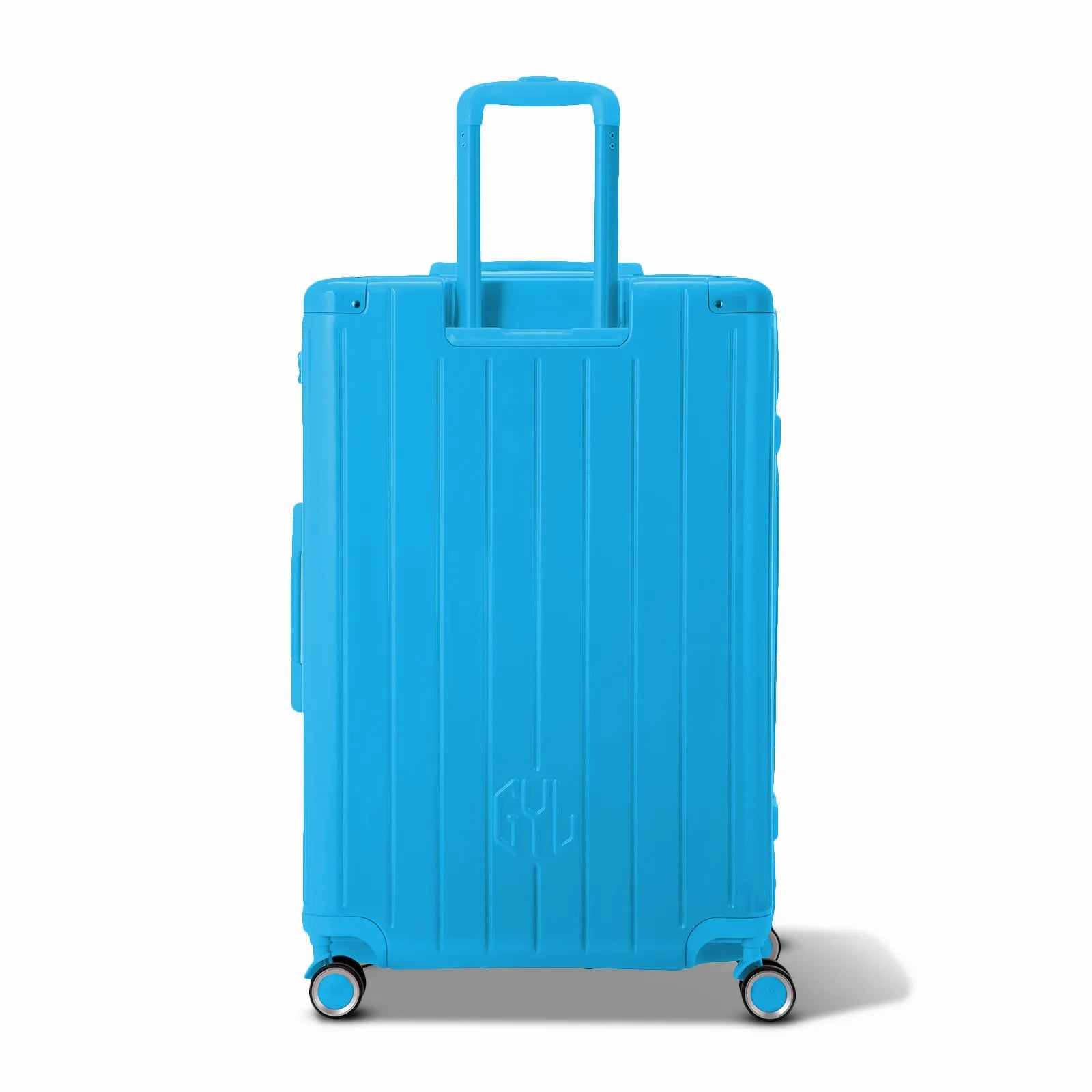 Vue arrière de la valise rigide GYL Intemporelle menthe avec poignées intégrées et roulettes pivotantes.