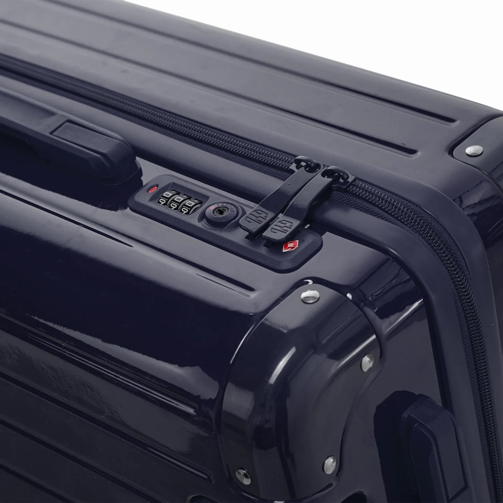 Fermeture à combinaison TSA et double curseur zippé GYL sur la valise rigide marine Intemporelle.