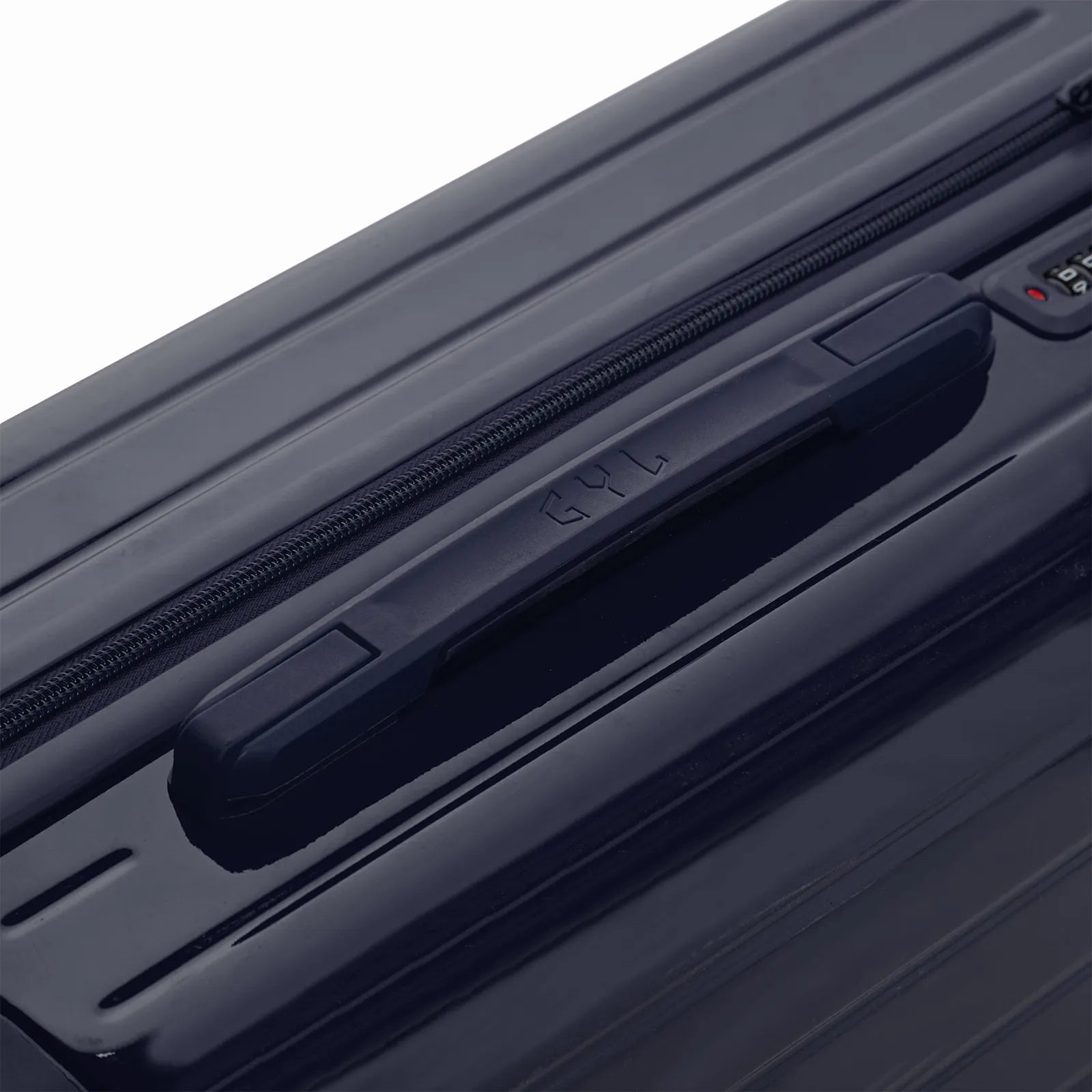 Poignée supérieure rigide de la valise GYL Intemporelle marine avec logo embossé sur le dessus.