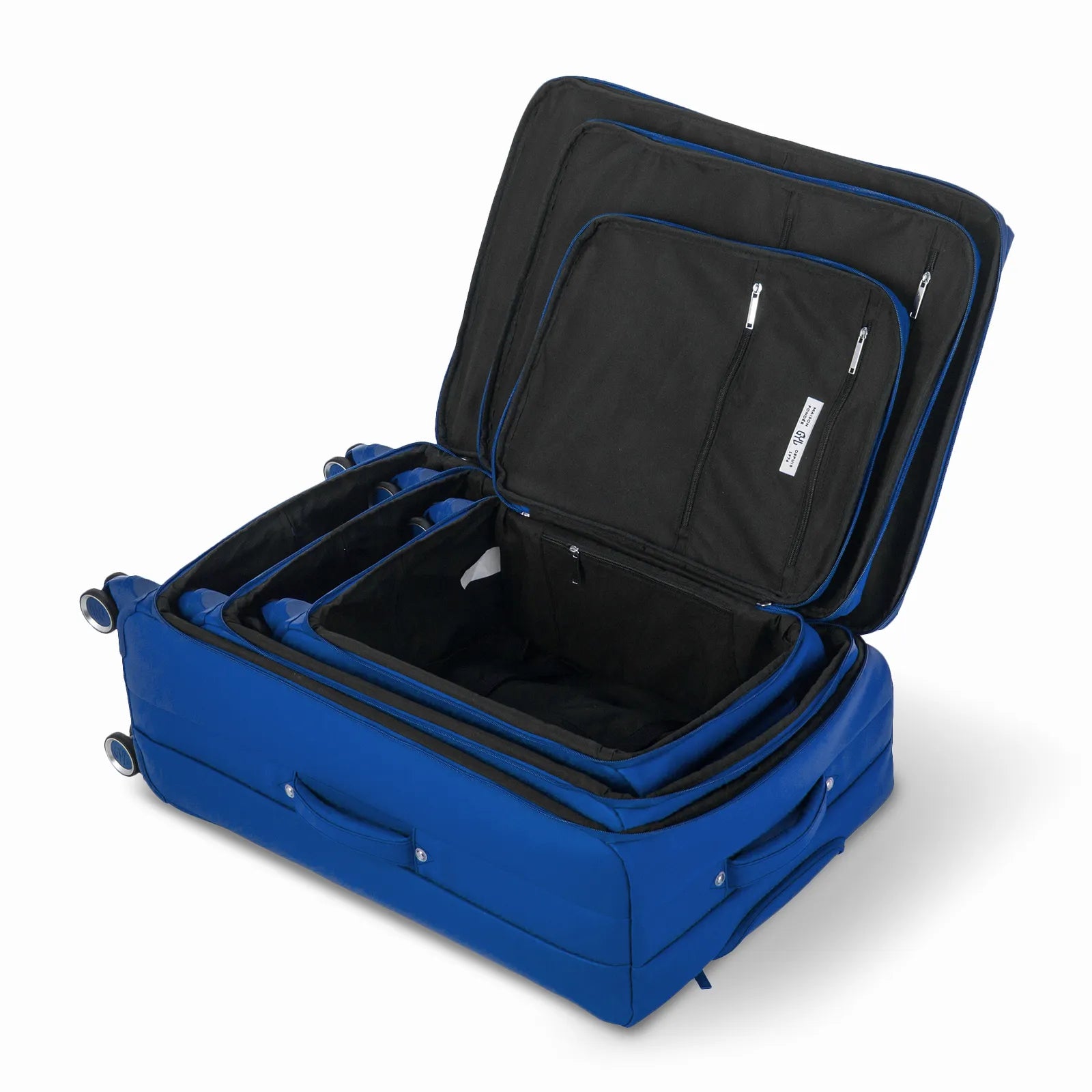 Ensemble de trois valises GYL Évasion en polyuréthane bleu, ouvertes et imbriquées les unes dans les autres pour montrer leur conception pratique et leur intérieur spacieux.