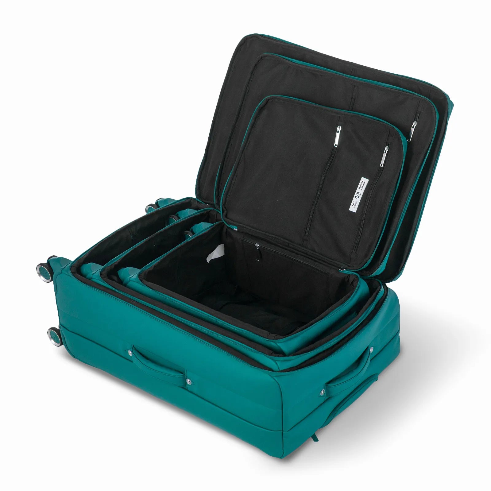 Ensemble de trois valises GYL Évasion en polyuréthane sapin, ouvertes et imbriquées les unes dans les autres pour montrer leur conception pratique et leur intérieur spacieux.