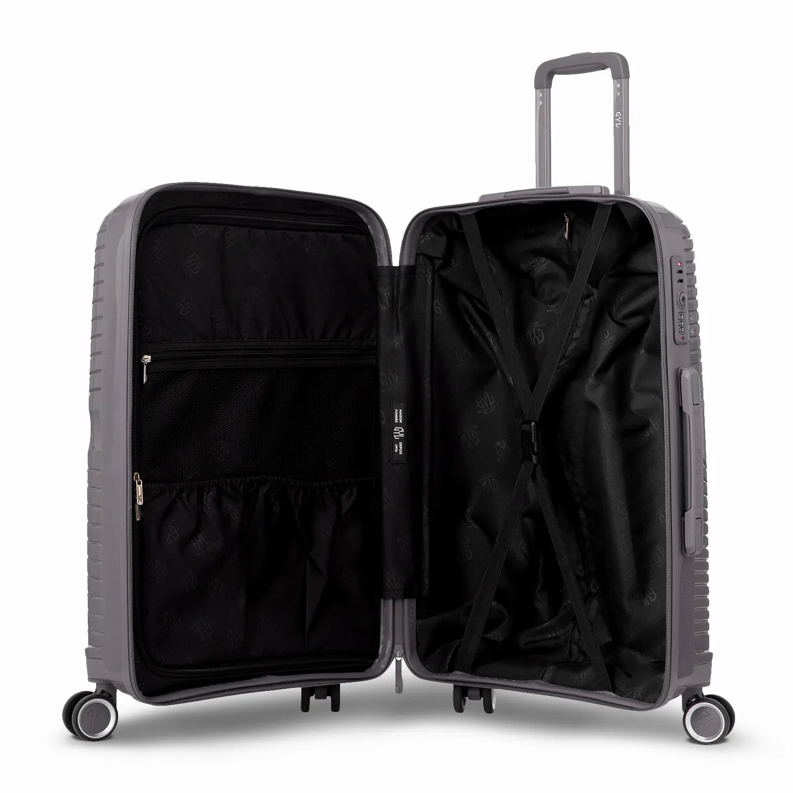 Intérieur de la valise cabine GYL Signature argent, avec sangles croisées et séparateur zippé en tissu.