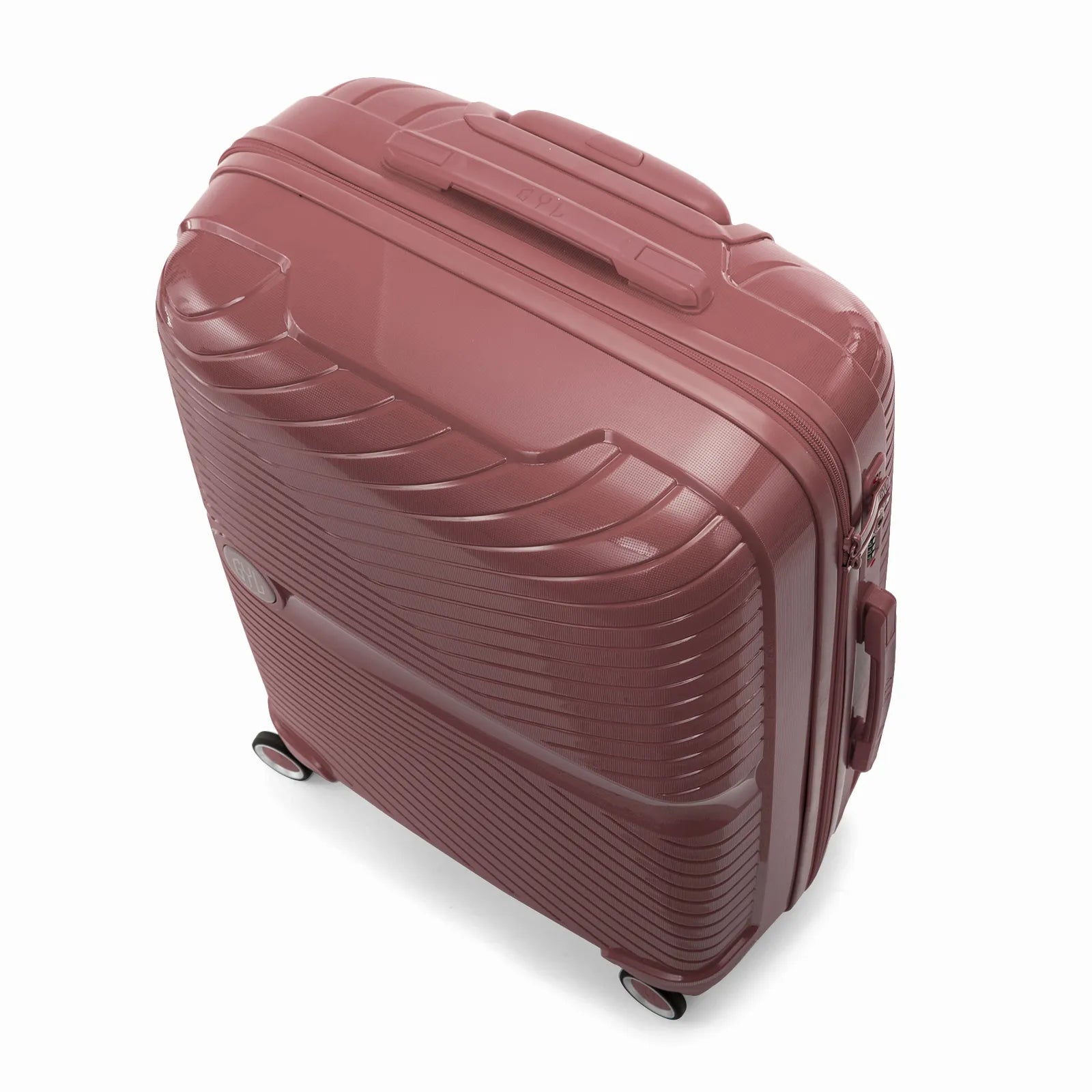 Valise cabine GYL Signature rose gold vue du dessus en diagonale, montrant la poignée supérieure et la structure nervurée.