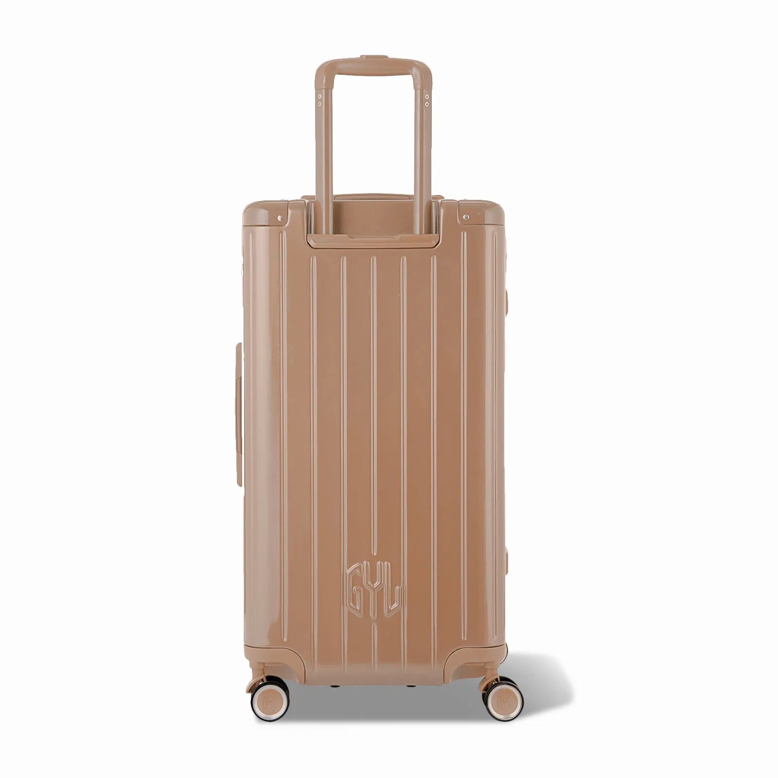 Dos de la valise trunk GYL L champagne avec trolley télescopique sorti et logo embossé.