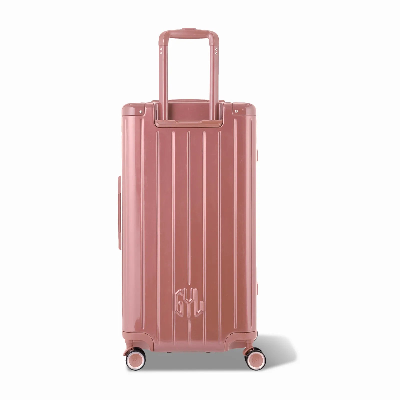 Dos de la valise trunk GYL L rose gold avec trolley télescopique sorti et logo embossé.
