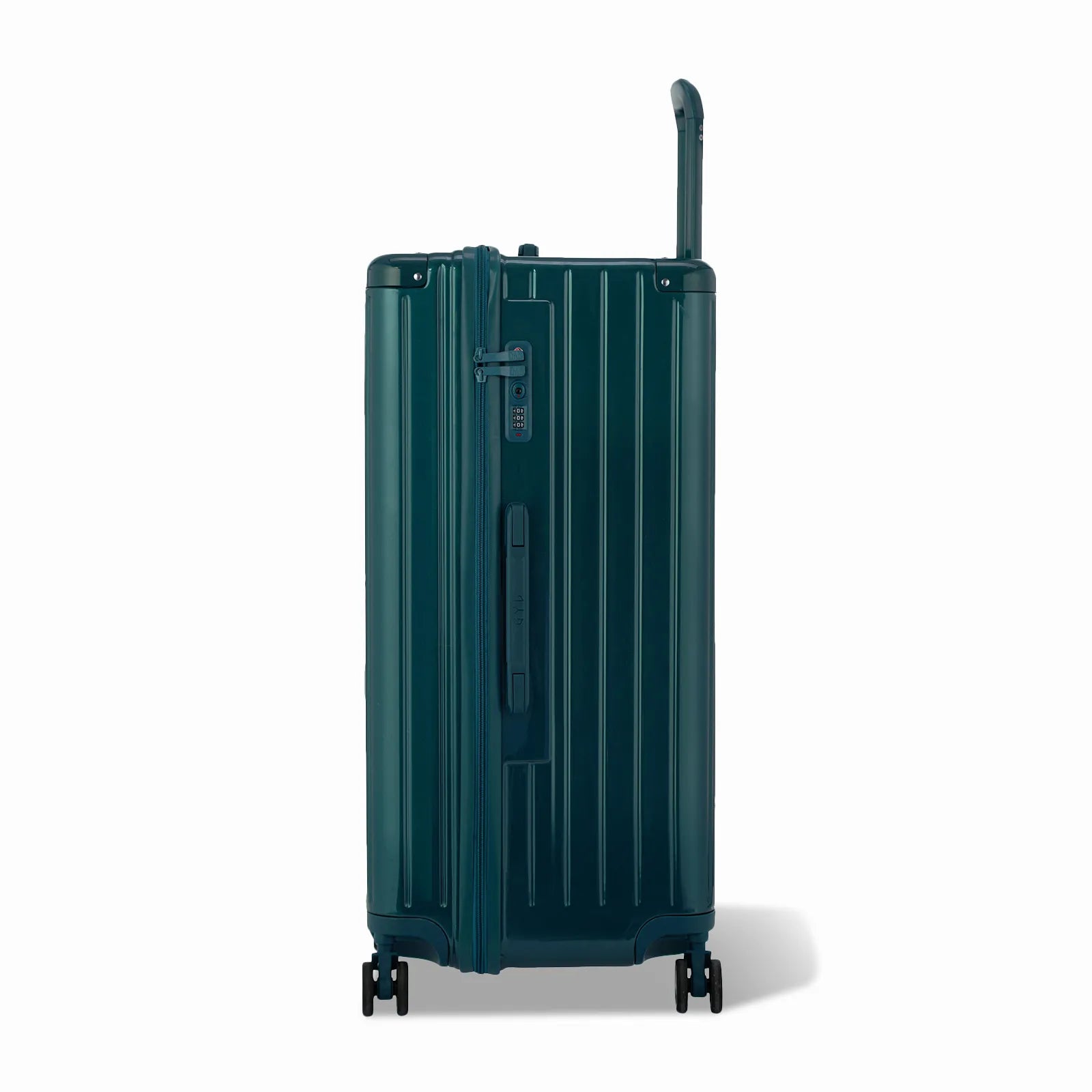 Côté de la valise trunk GYL XL sapin avec serrure TSA intégrée et poignée latérale assortie.