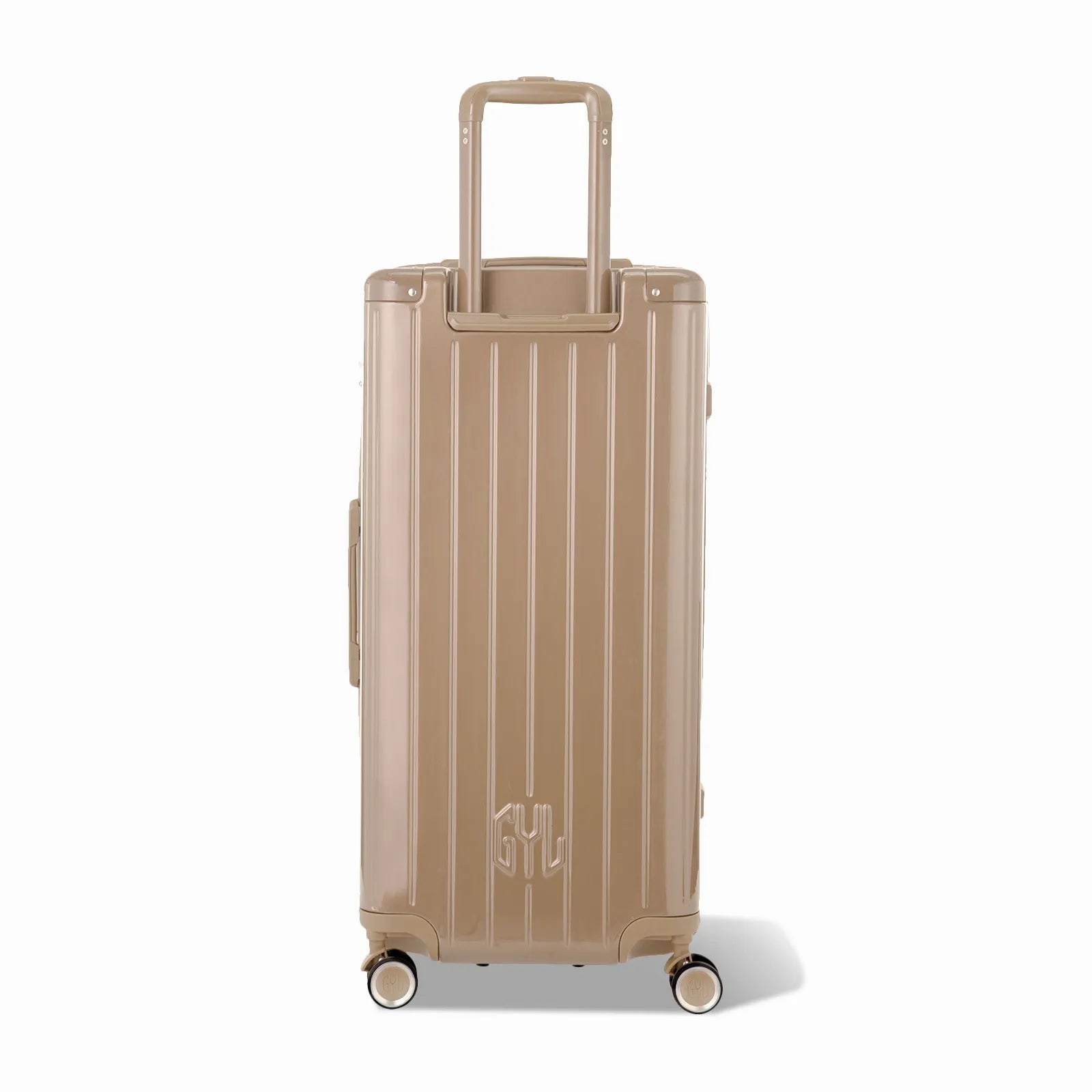 Dos de la valise trunk GYL XL champagne avec trolley télescopique sorti et logo embossé.
