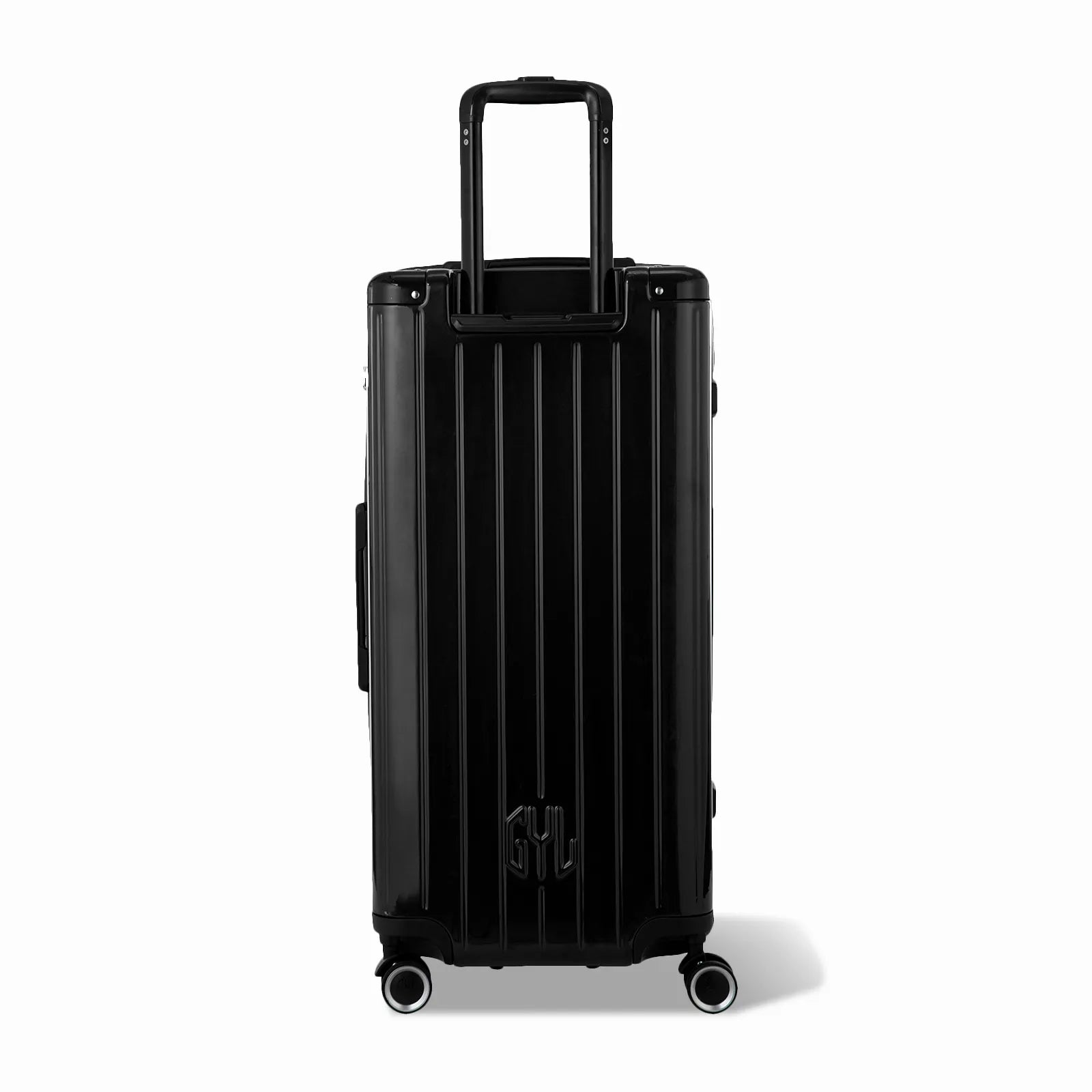 Dos de la valise trunk GYL XL noir avec trolley télescopique sorti et logo embossé.