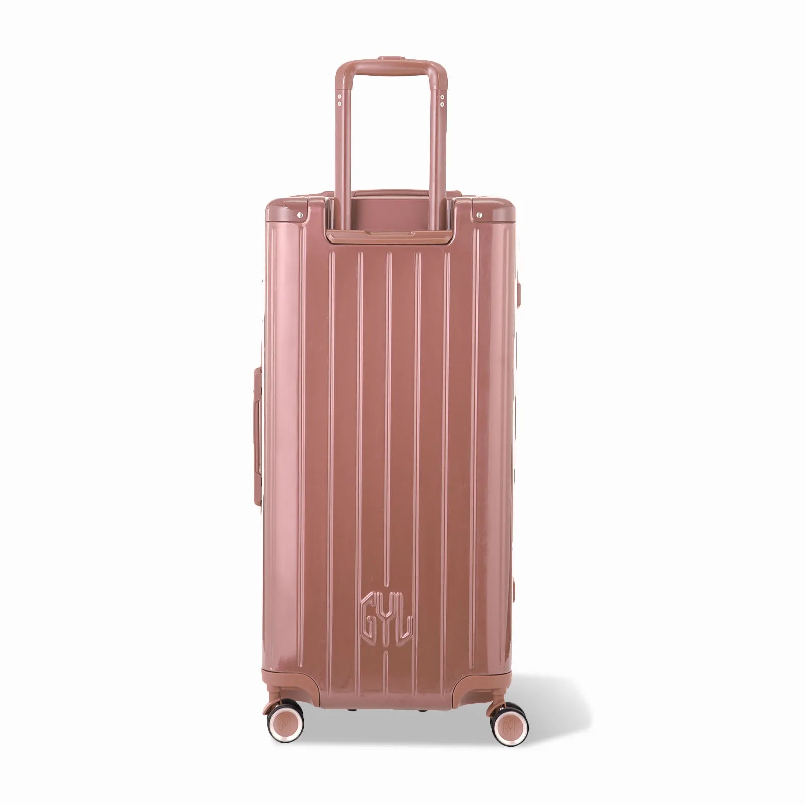 Dos de la valise trunk GYL XL rose gold avec trolley télescopique sorti et logo embossé.
