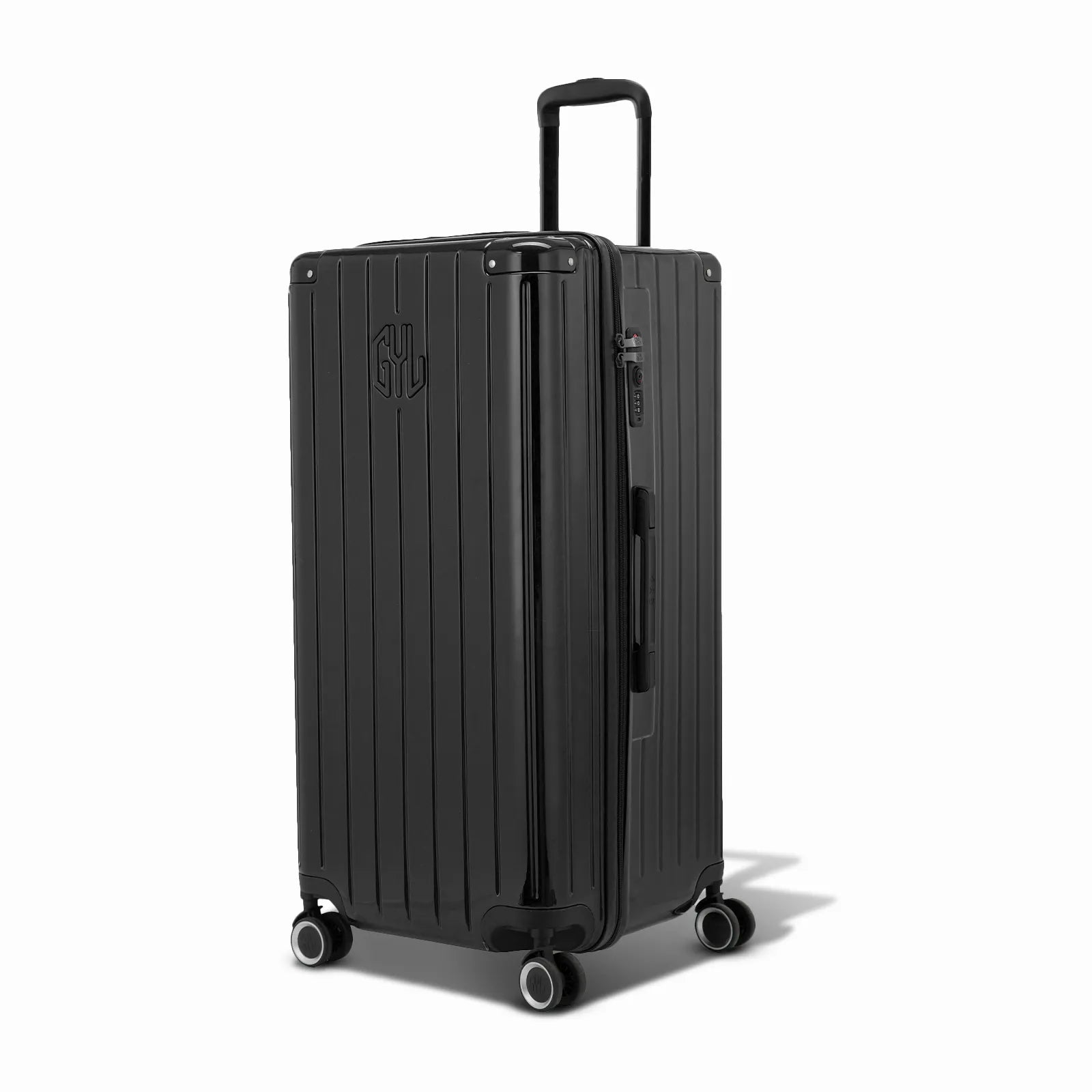 Valise trunk GYL taille XL en polycarbonate noire vue de trois quarts, avec trolley déployé et roues 360°.