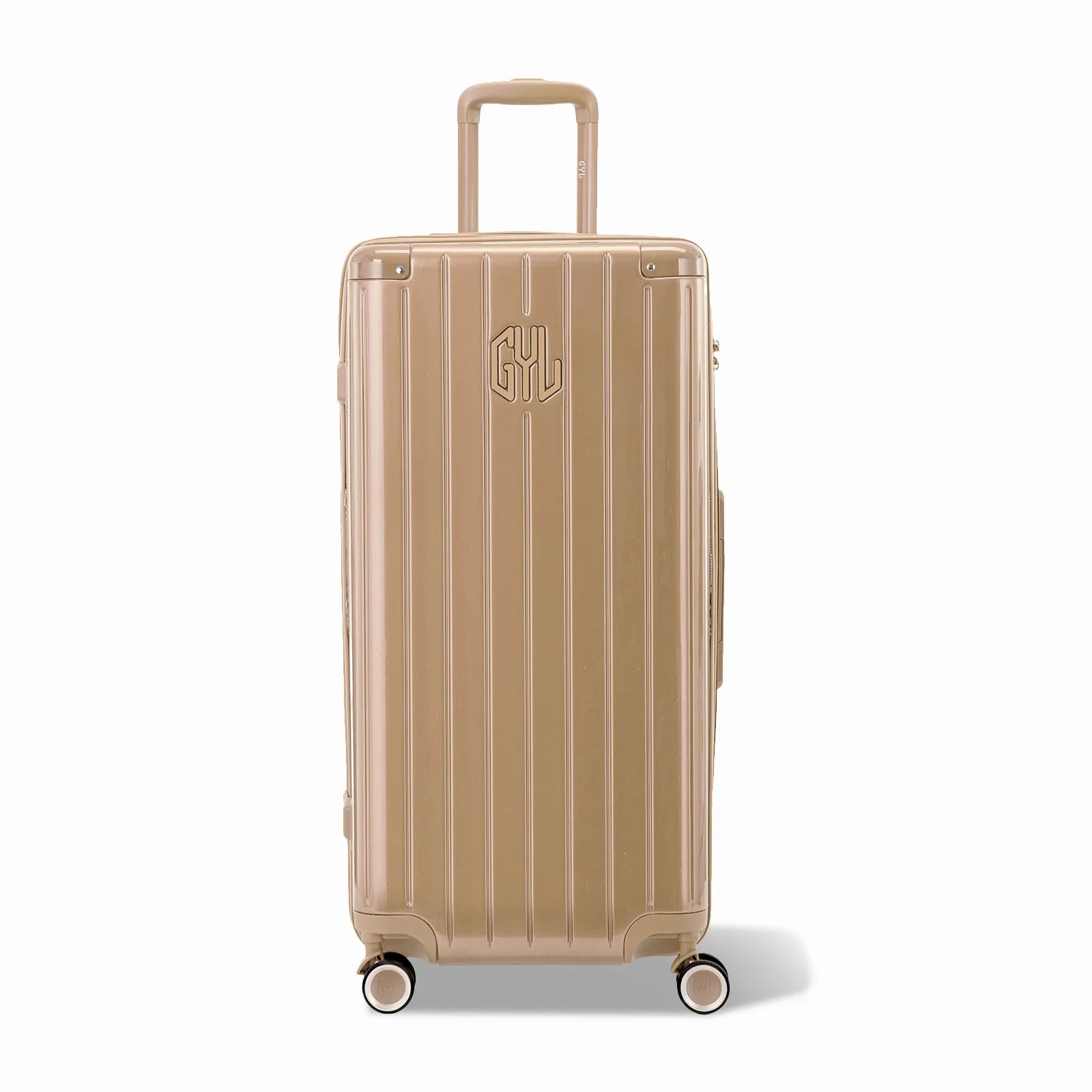 Valise trunk GYL taille XL en polycarbonate champagne vue de face, avec trolley déployé et roues 360°.