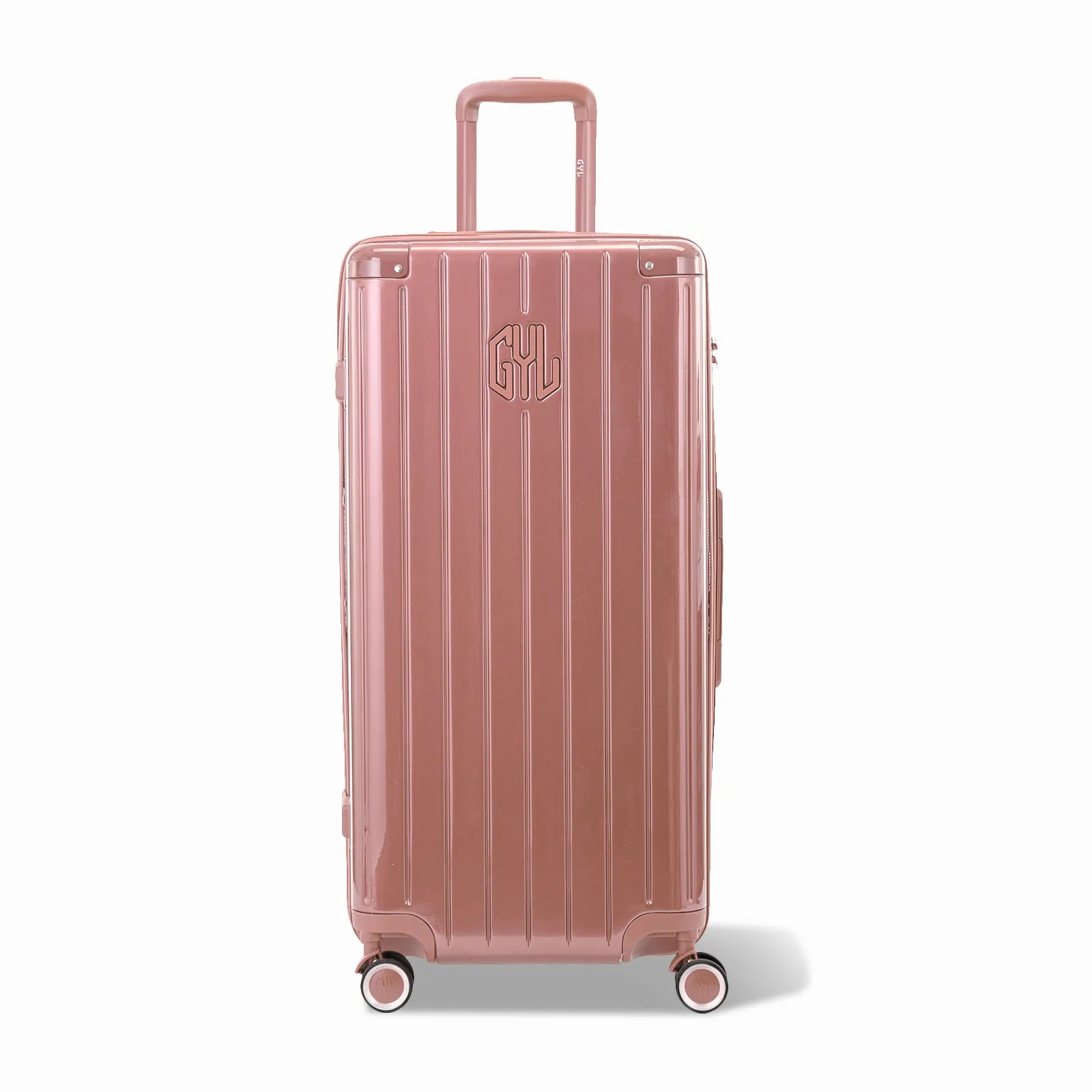 Valise trunk GYL taille XL en polycarbonate rose gold vue de face, avec trolley déployé et roues 360°.