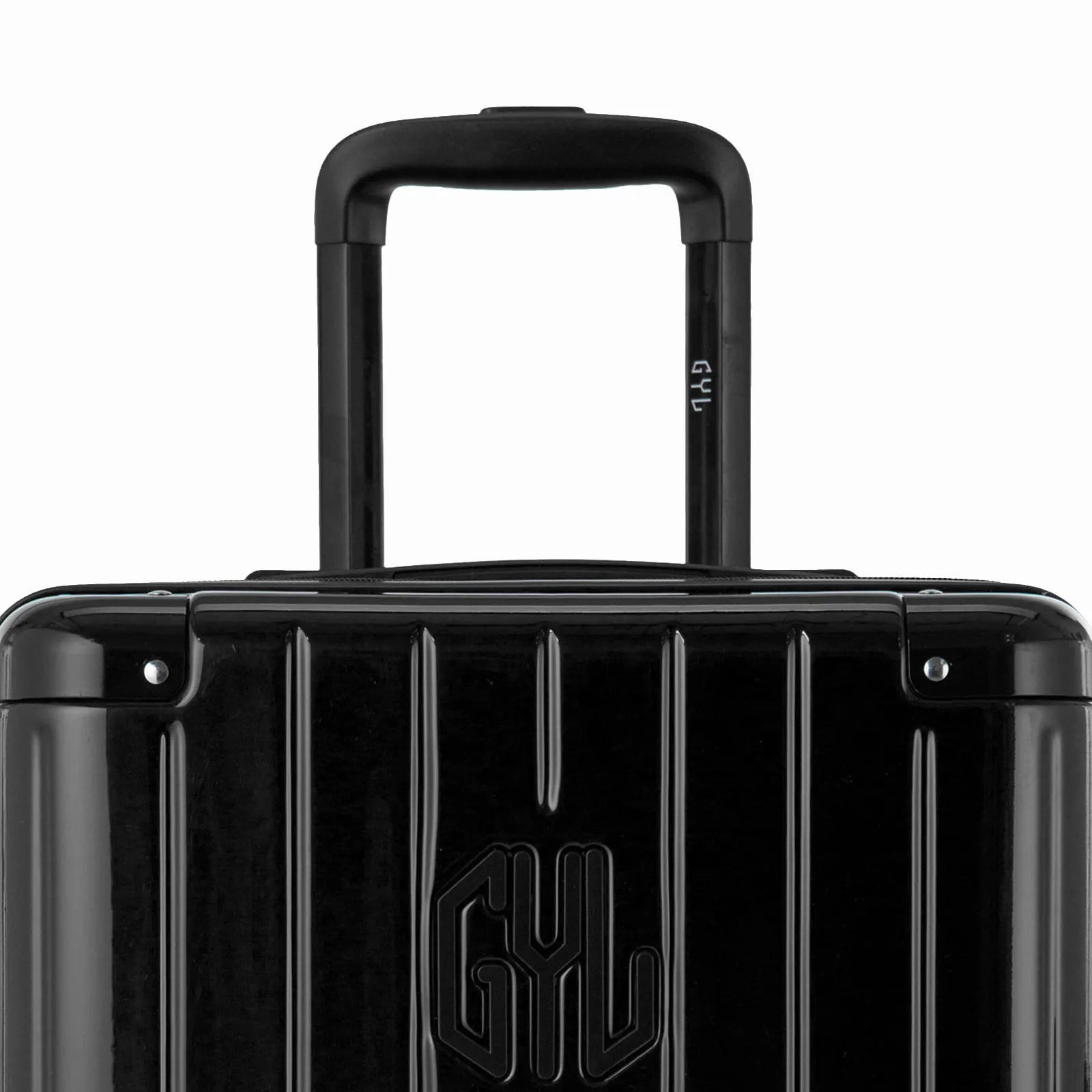 Zoom sur la poignée trolley et le logo GYL de la valise trunk noir.