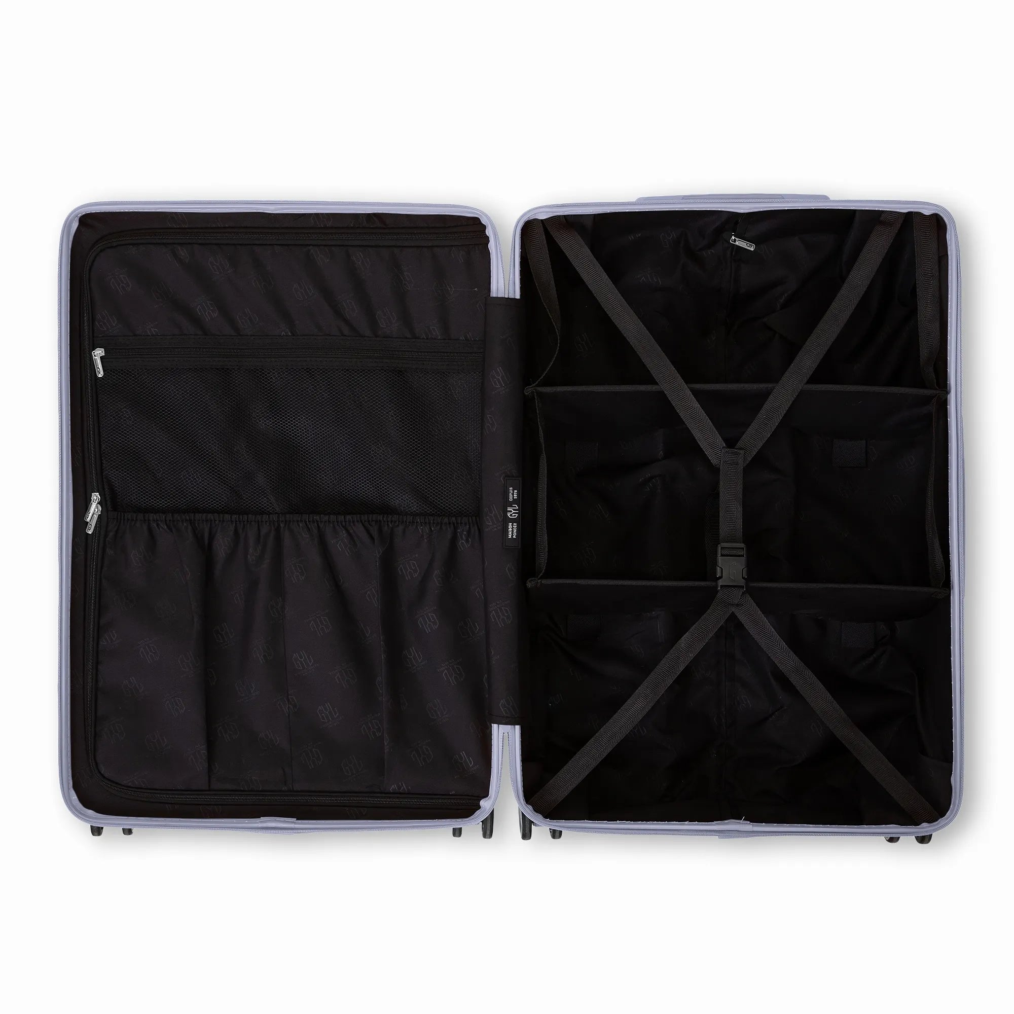 Intérieur compartimenté de la valise GYL Intemporelle argent avec sangles croisées et poches filet.