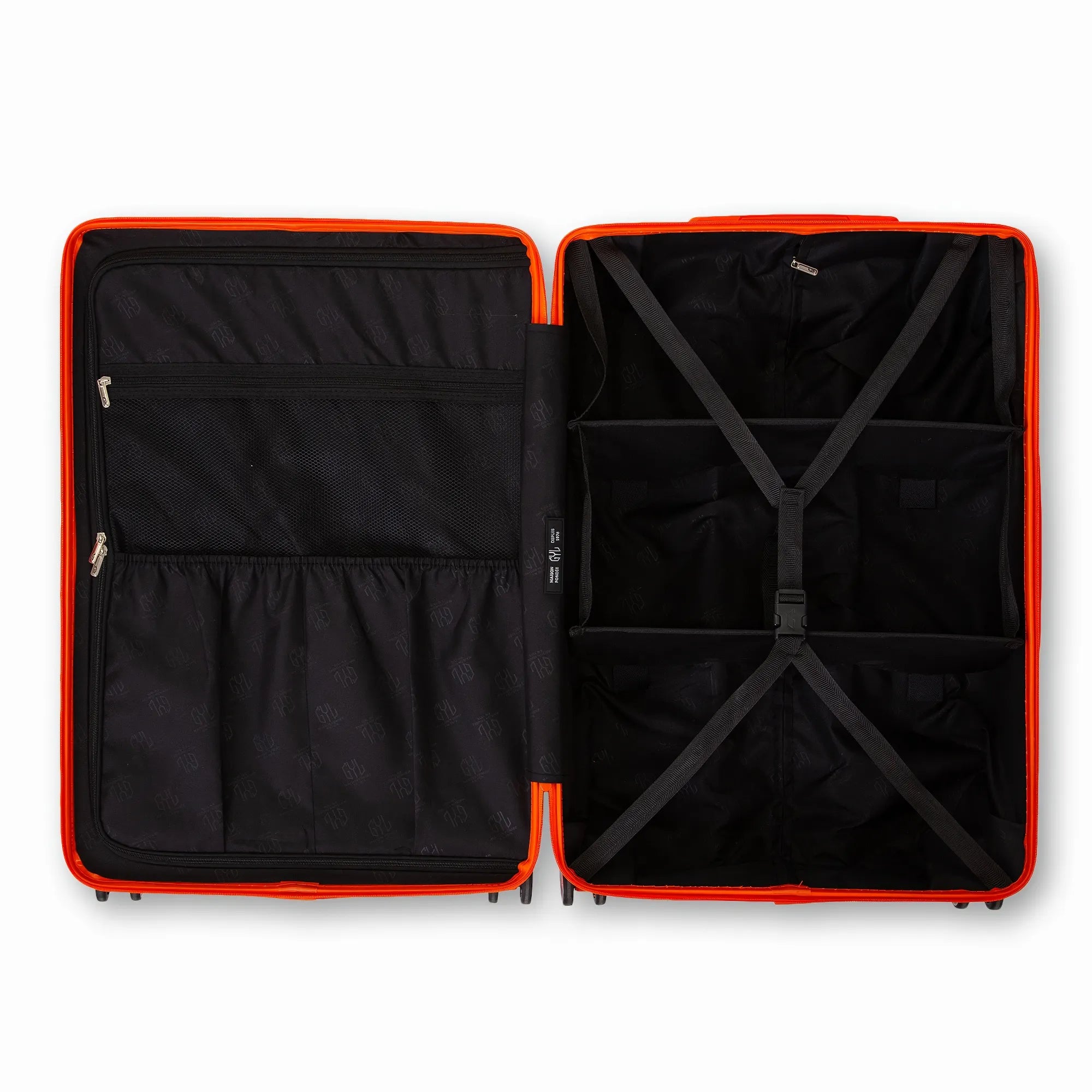 Intérieur compartimenté de la valise GYL Intemporelle orange avec sangles croisées et poches filet.