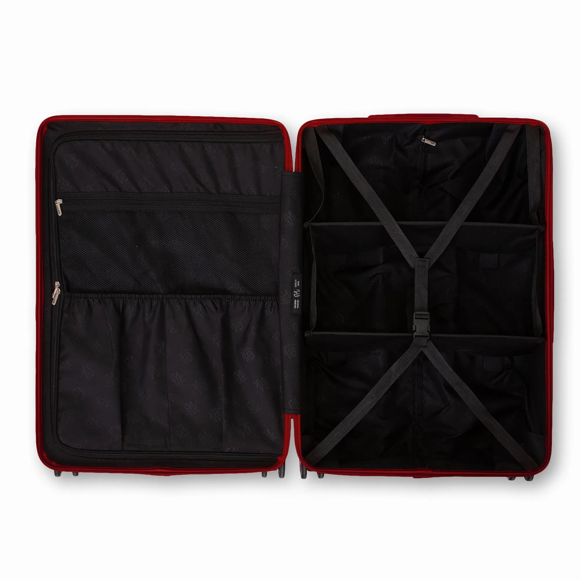Intérieur compartimenté de la valise GYL Intemporelle rouge foncé avec sangles croisées et poches filet.