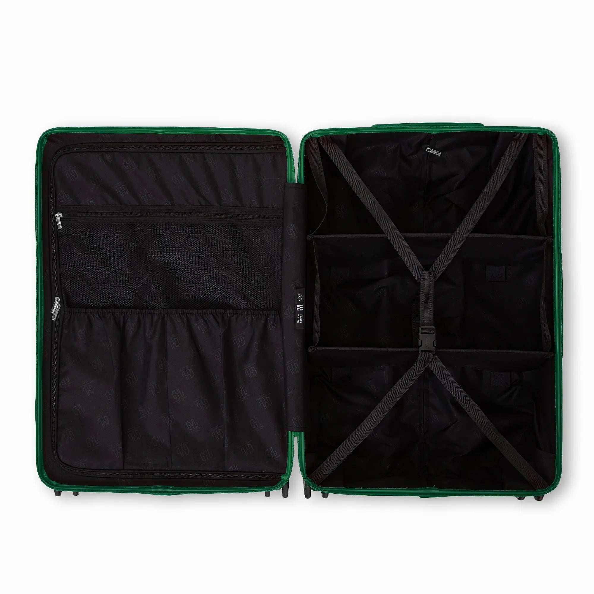 Intérieur compartimenté de la valise GYL Intemporelle sapin avec sangles croisées et poches filet.