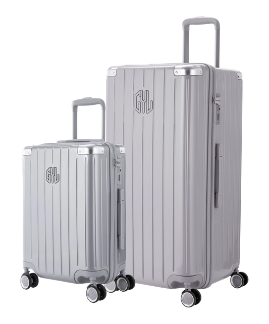 Pack 2 valises rigides GYL Trunk XL et Cabine S argent, polycarbonate, 4 roues 360°, vue trois quarts