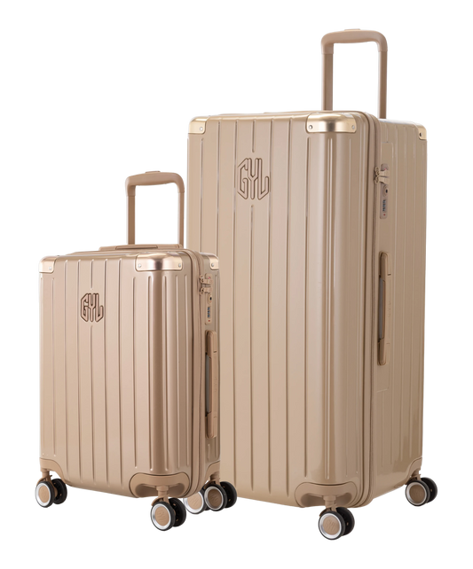 Pack 2 valises rigides GYL Trunk XL et Cabine S champagne, polycarbonate, 4 roues 360°, vue trois quarts