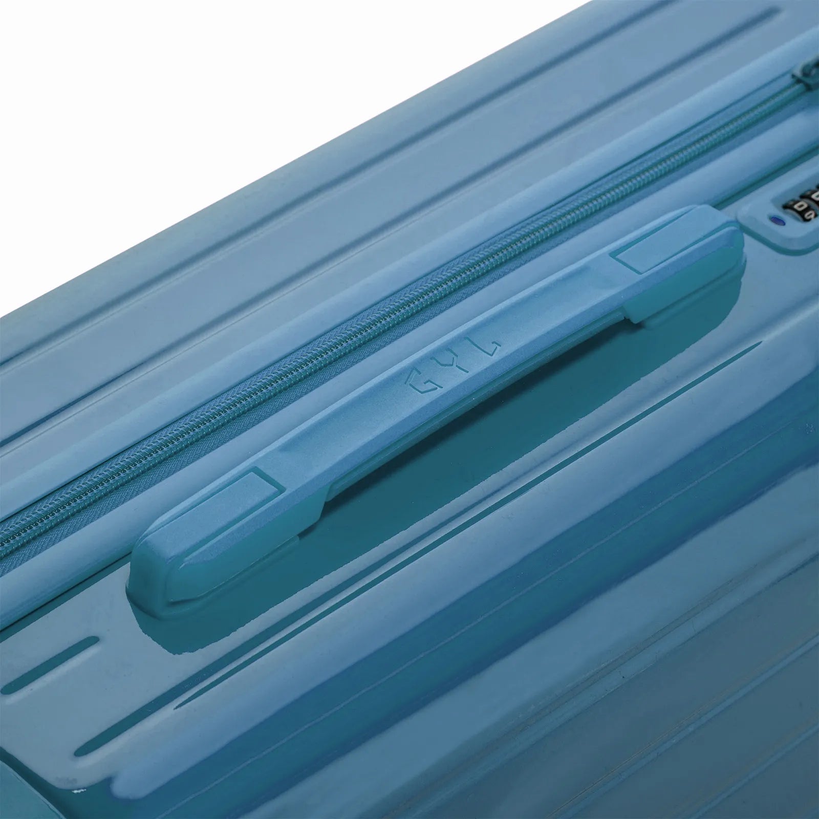 Poignée supérieure rigide de la valise GYL Intemporelle bleu grisé avec logo embossé sur le dessus.