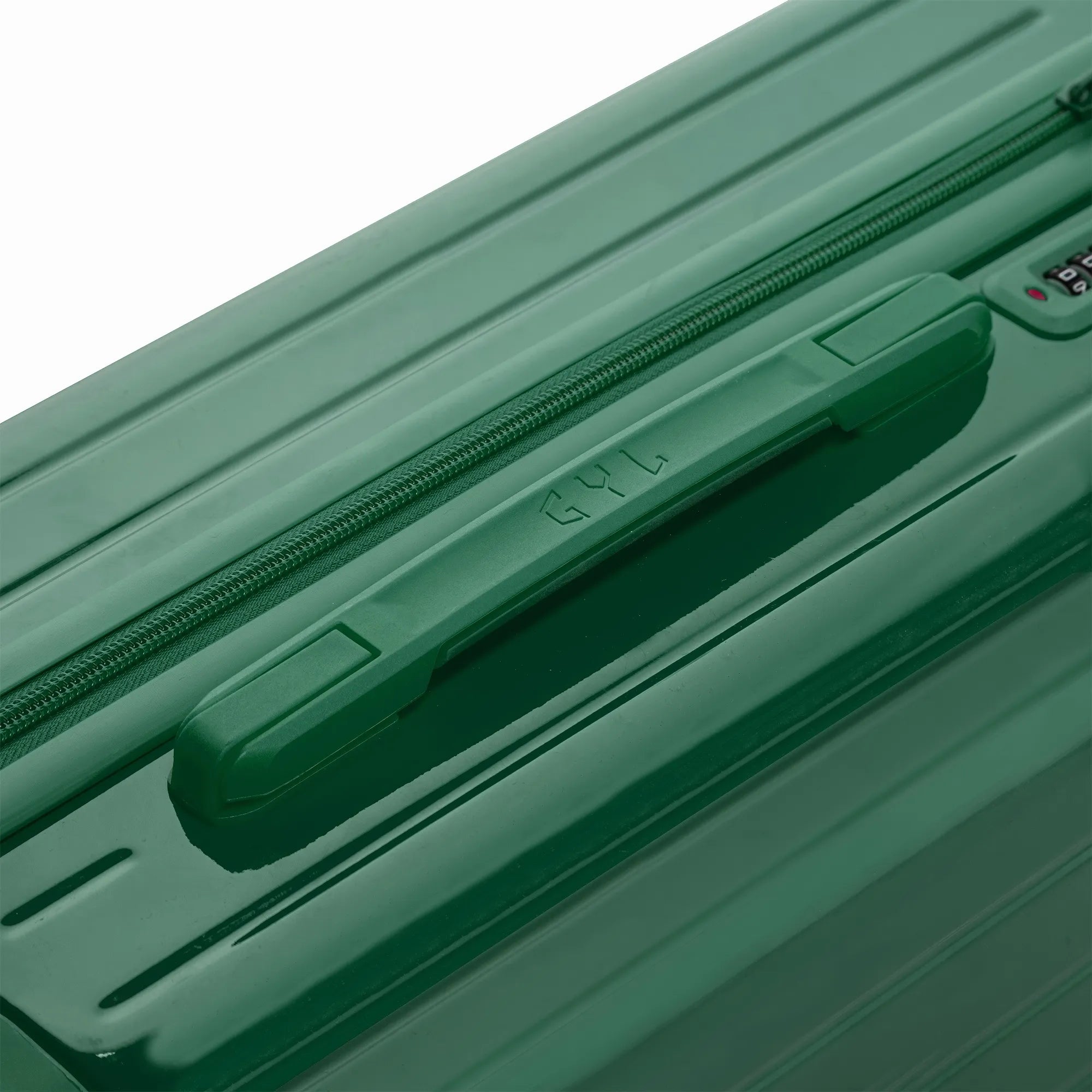 Poignée supérieure rigide de la valise GYL Intemporelle sapin avec logo embossé sur le dessus.