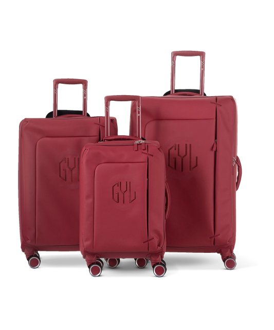 Set de 3 valises souples Évasion en polyuréthane imperméable coloris rouge foncé tailles cabine 55, semaine 65 et soute 75 cm vue de face avec logo GYL