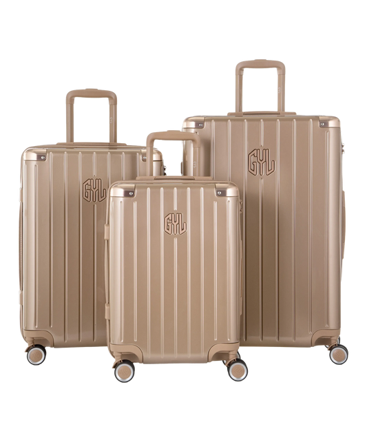 Valise Intemporelle en polycarbonate set de 3 valises cabine semaine et soute coloris champagne vue de face du set complet