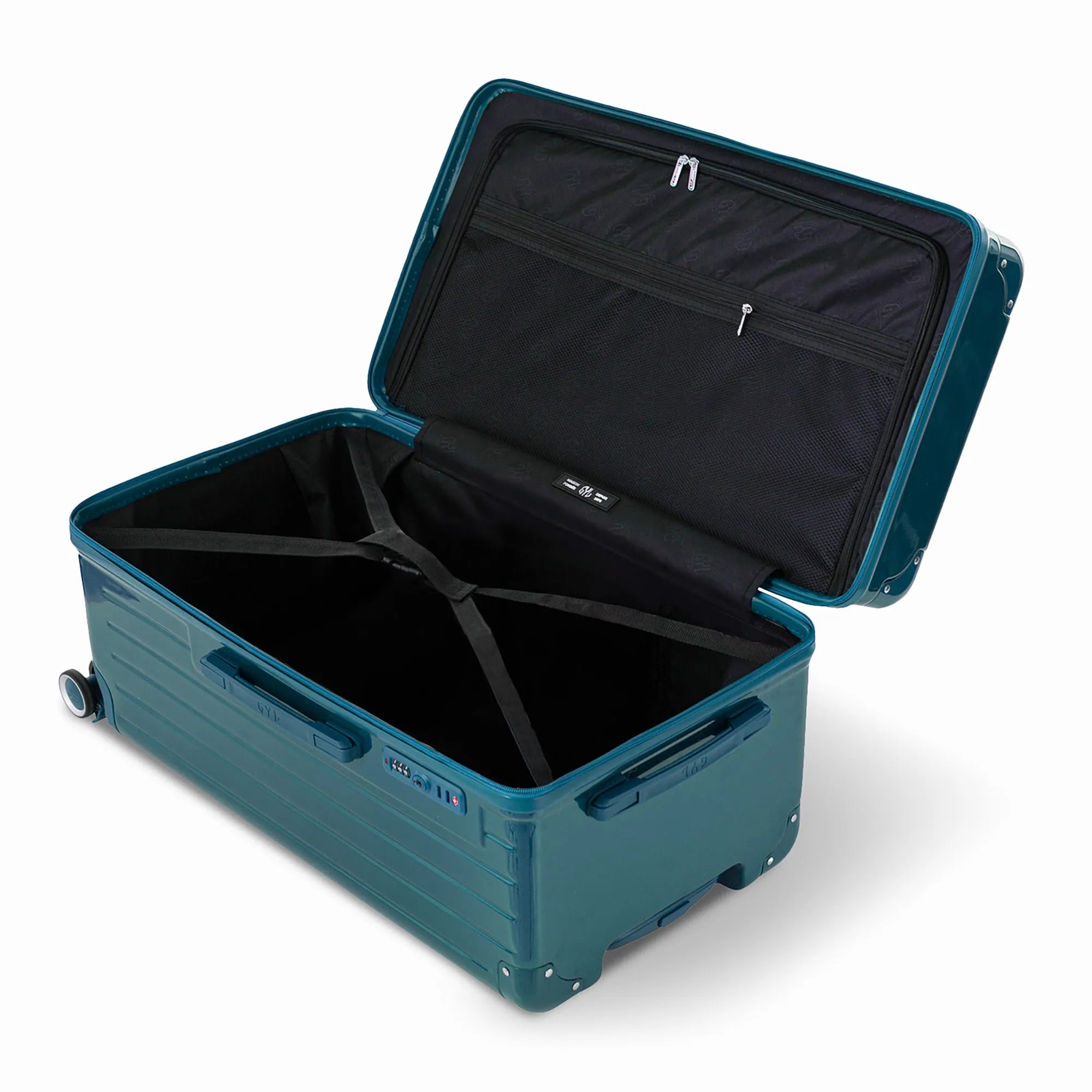 Intérieur de la valise trunk GYL L sapin ouvert, avec sangles croisées.