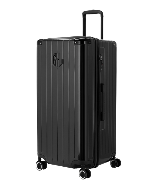 Valise Trunk XL Intemporelle GYL en polycarbonate 78 cm coloris noir vue trois quarts avant