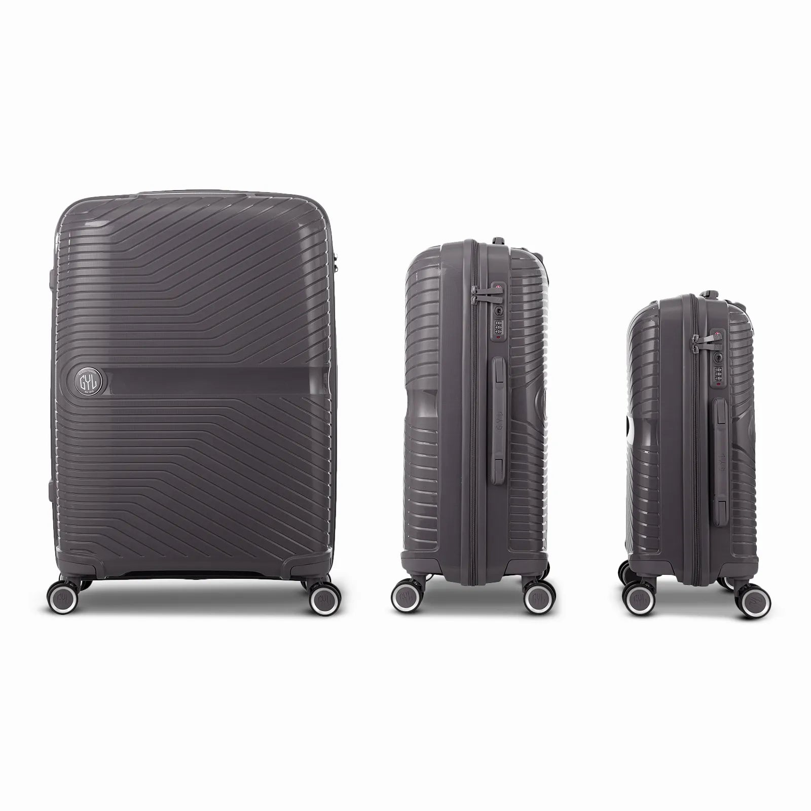 Ensemble de trois valises GYL Signature en polypropylène couleur champagne, présentées alignées de face et de profil, incluant les formats cabine, moyenne et soute.
