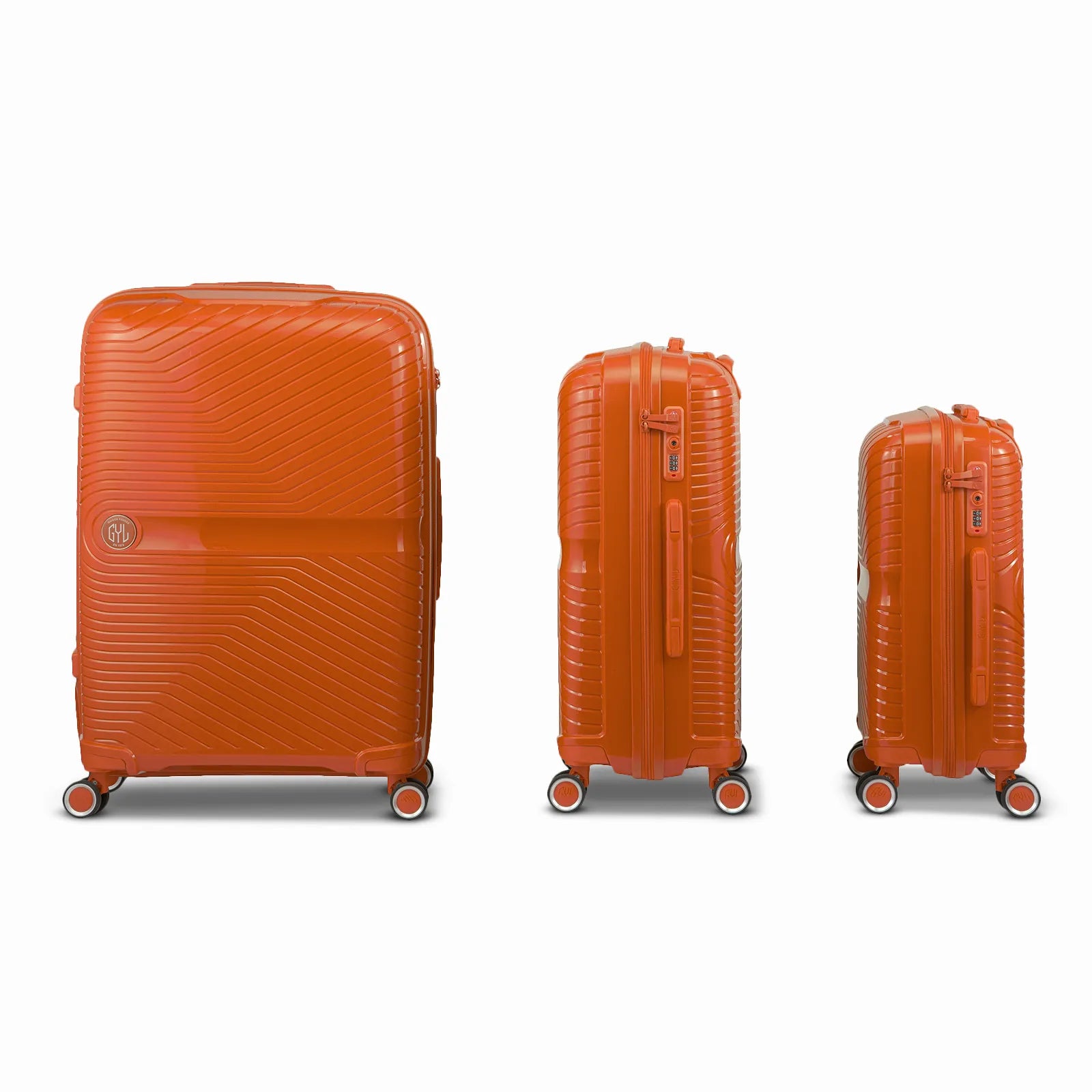 Ensemble de trois valises GYL Signature en polypropylène couleur orange, présentées alignées de face et de profil, incluant les formats cabine, moyenne et soute.