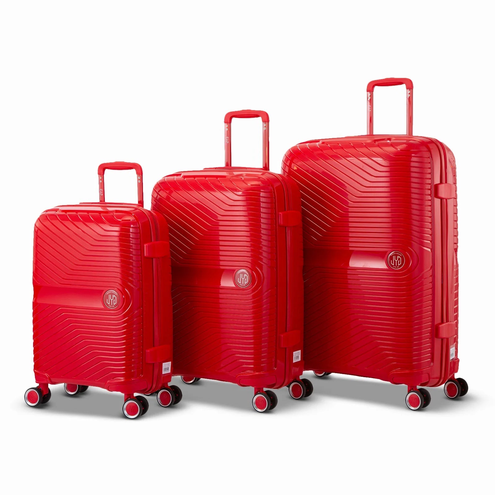 Ensemble de trois valises GYL Signature en polypropylène rouge, comprenant les formats cabine, moyenne et soute, avec trolley télescopique et roues doubles 360°.