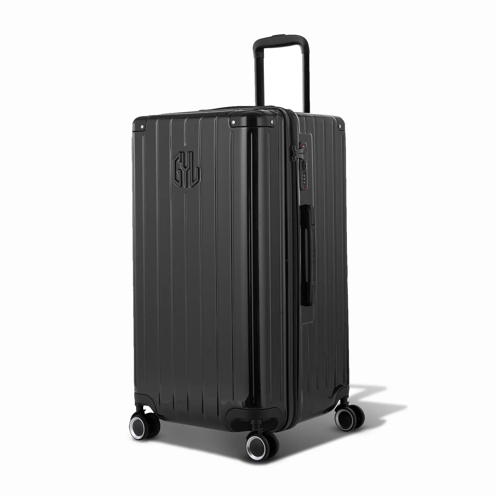 Valise trunk GYL taille L en polycarbonate noir vue de trois quarts, avec trolley déployé et roues 360°