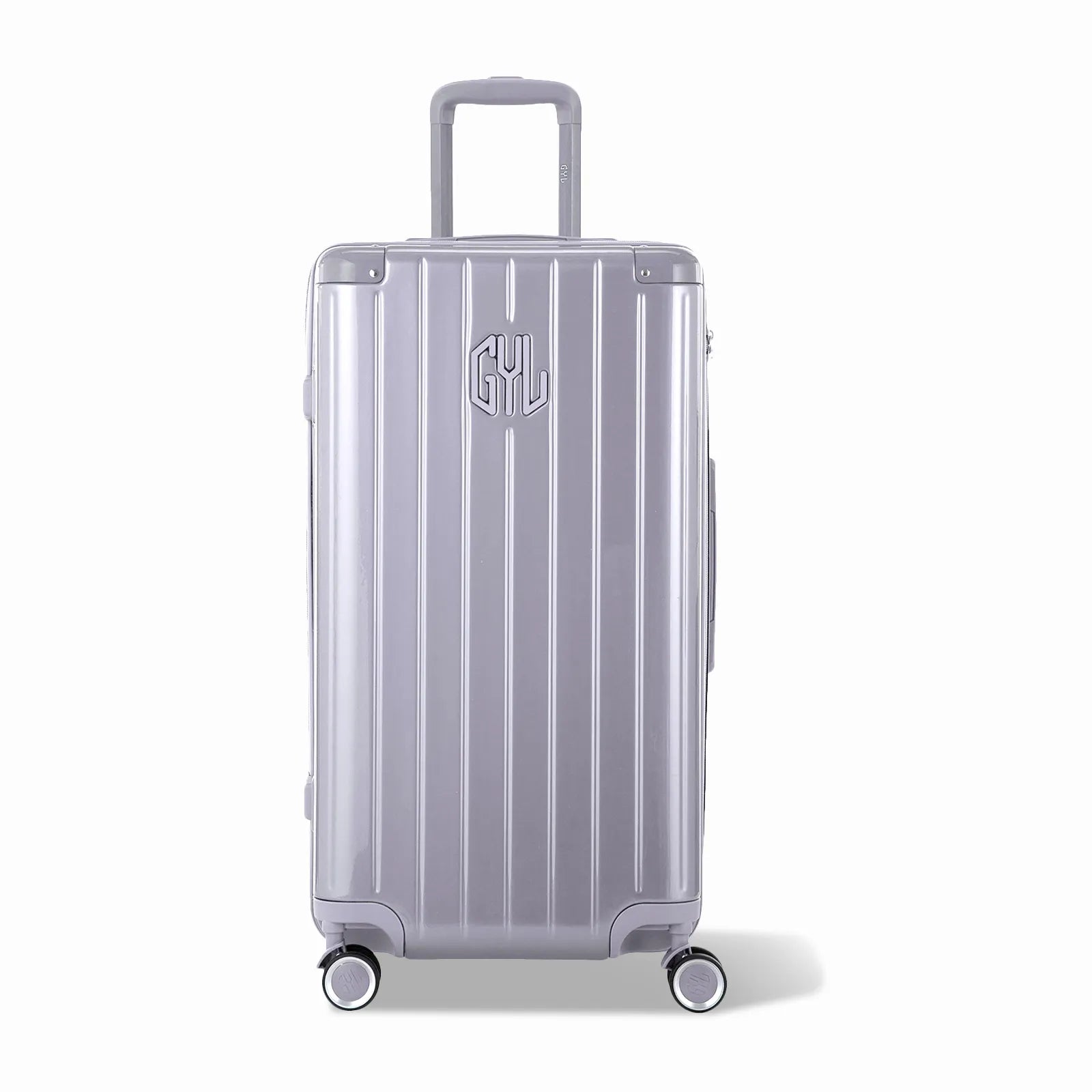 Valise trunk GYL taille L en polycarbonate argent vue de face, avec trolley déployé et roues 360°