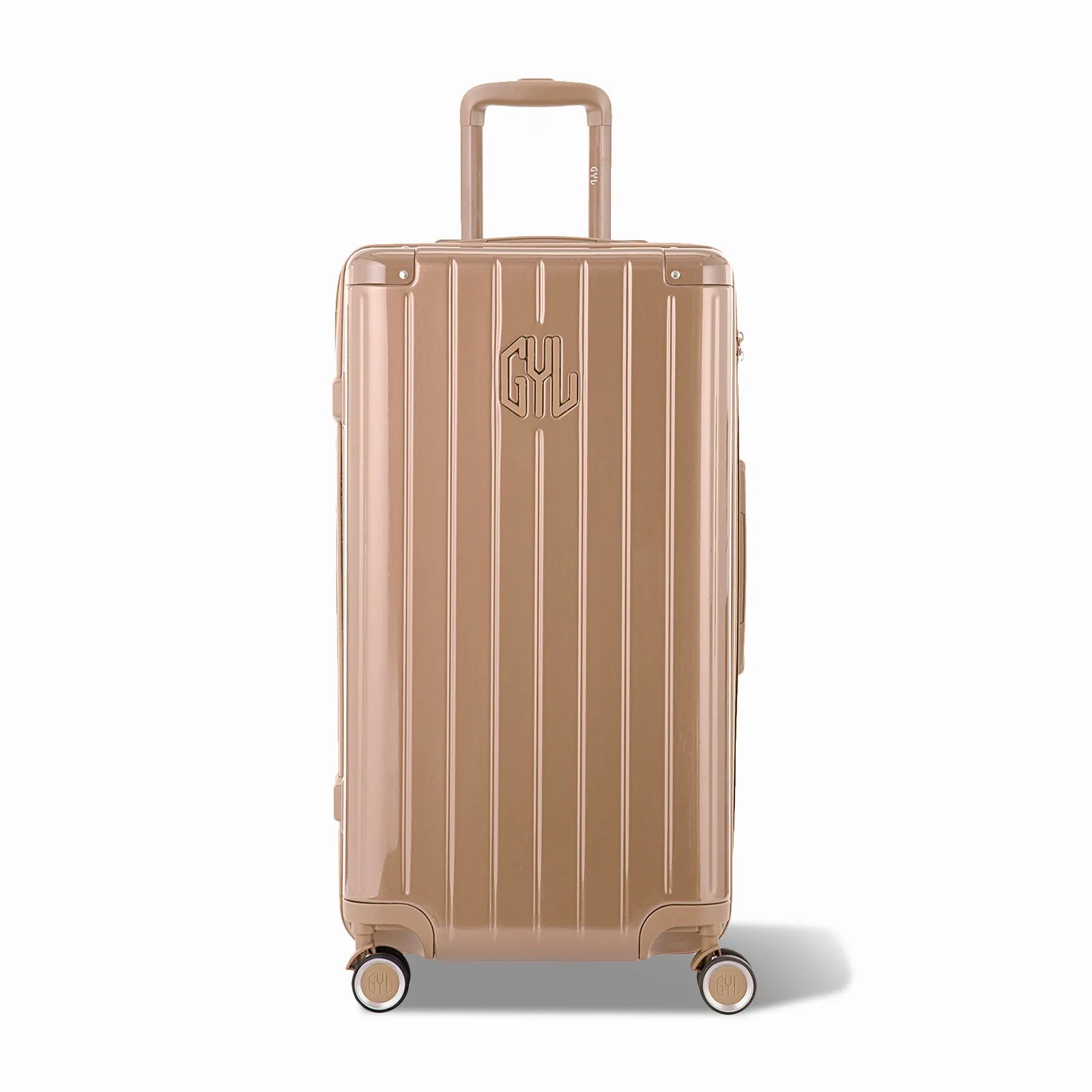 Valise trunk GYL taille L en polycarbonate champagne vue de face, avec trolley déployé et roues 360°