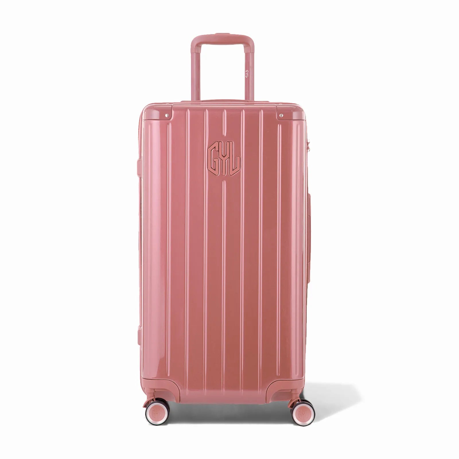 Valise trunk GYL taille L en polycarbonate rose gold vue de face, avec trolley déployé et roues 360°