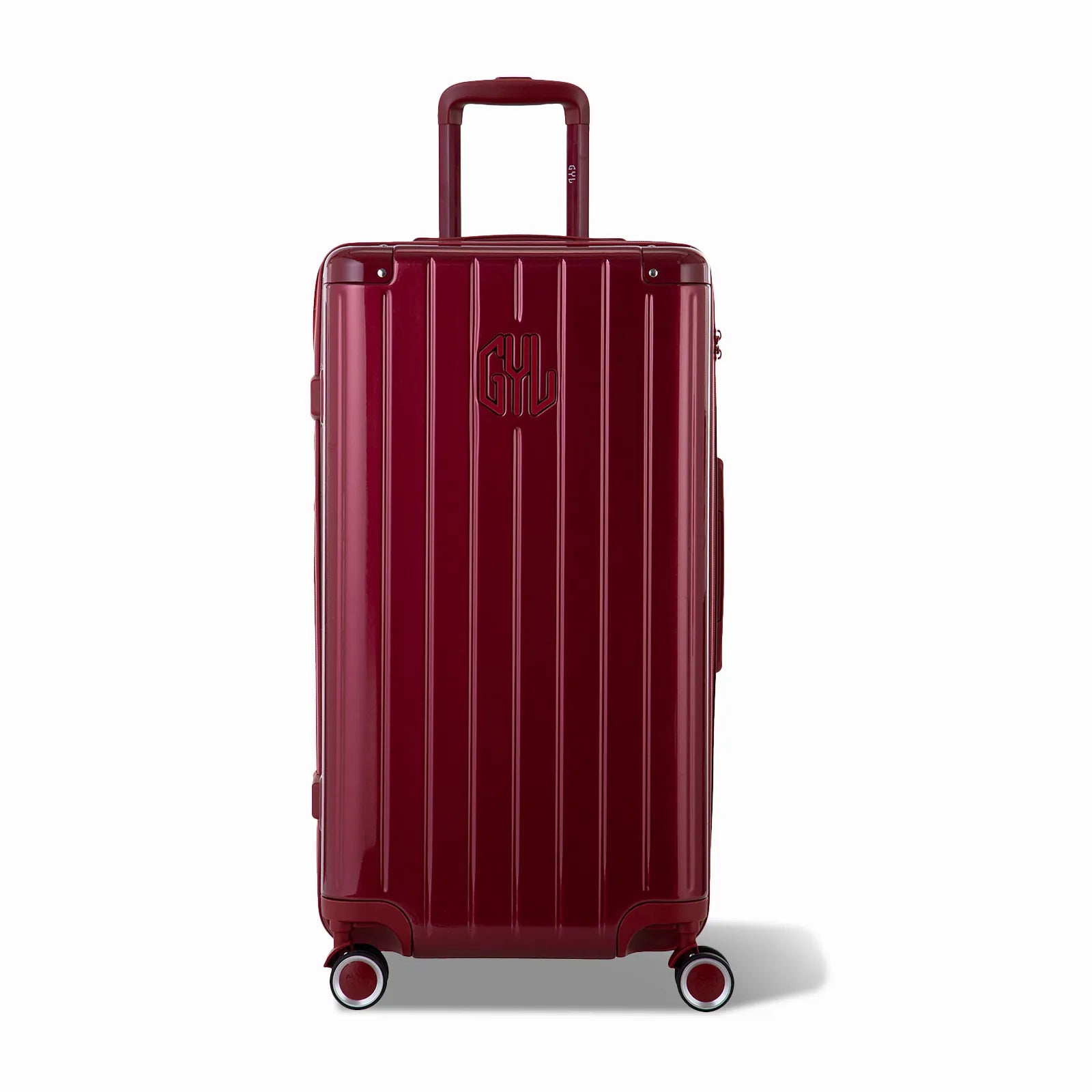 Valise trunk GYL taille L en polycarbonate rouge foncé vue de face, avec trolley déployé et roues 360°