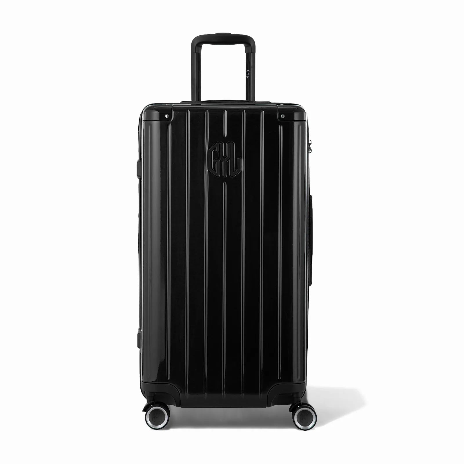 Valise trunk GYL taille L en polycarbonate noir vue de face, avec trolley déployé et roues 360°