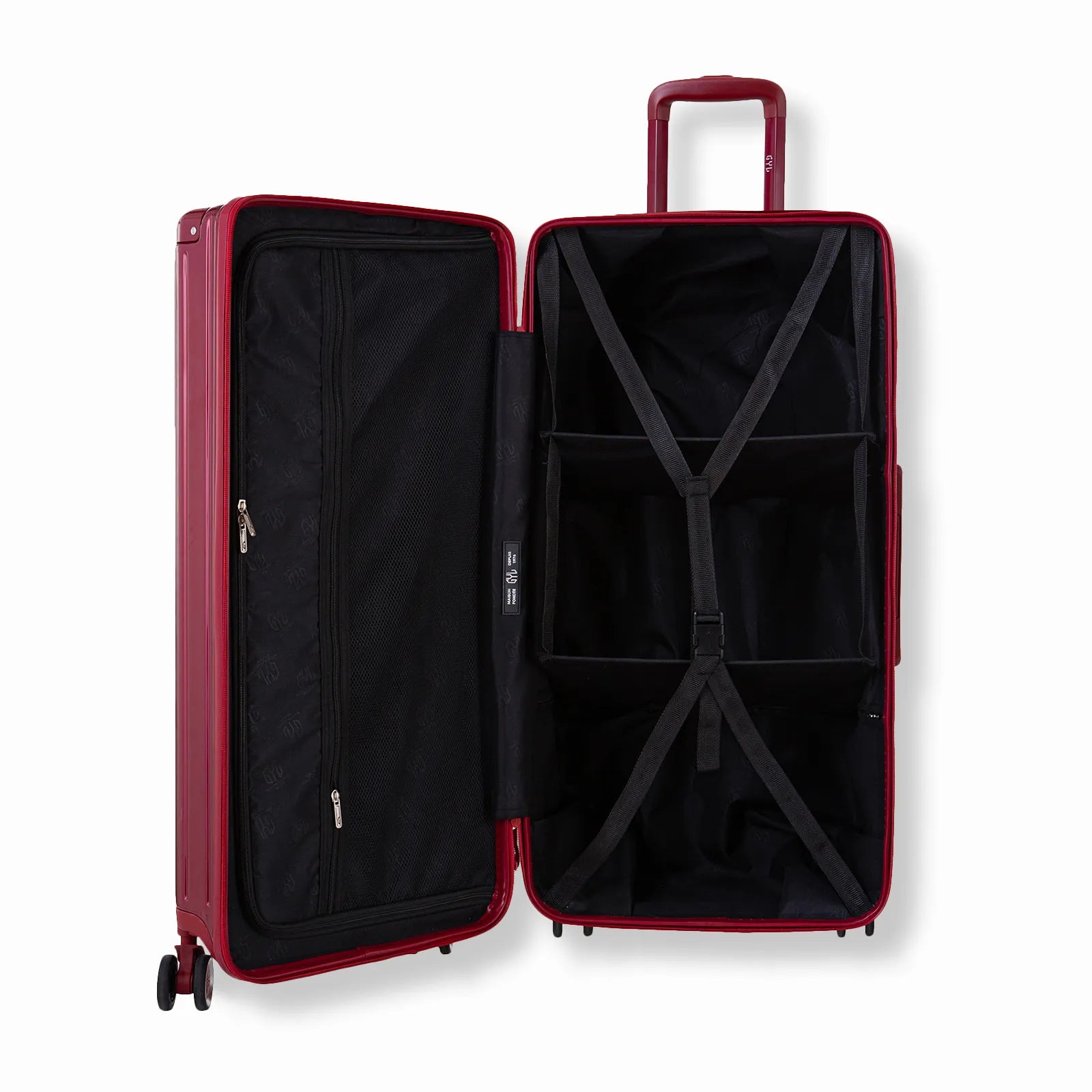 Valise trunk GYL L rouge foncé ouverte en position verticale, montrant la double séparation intérieure et les sangles de maintien.