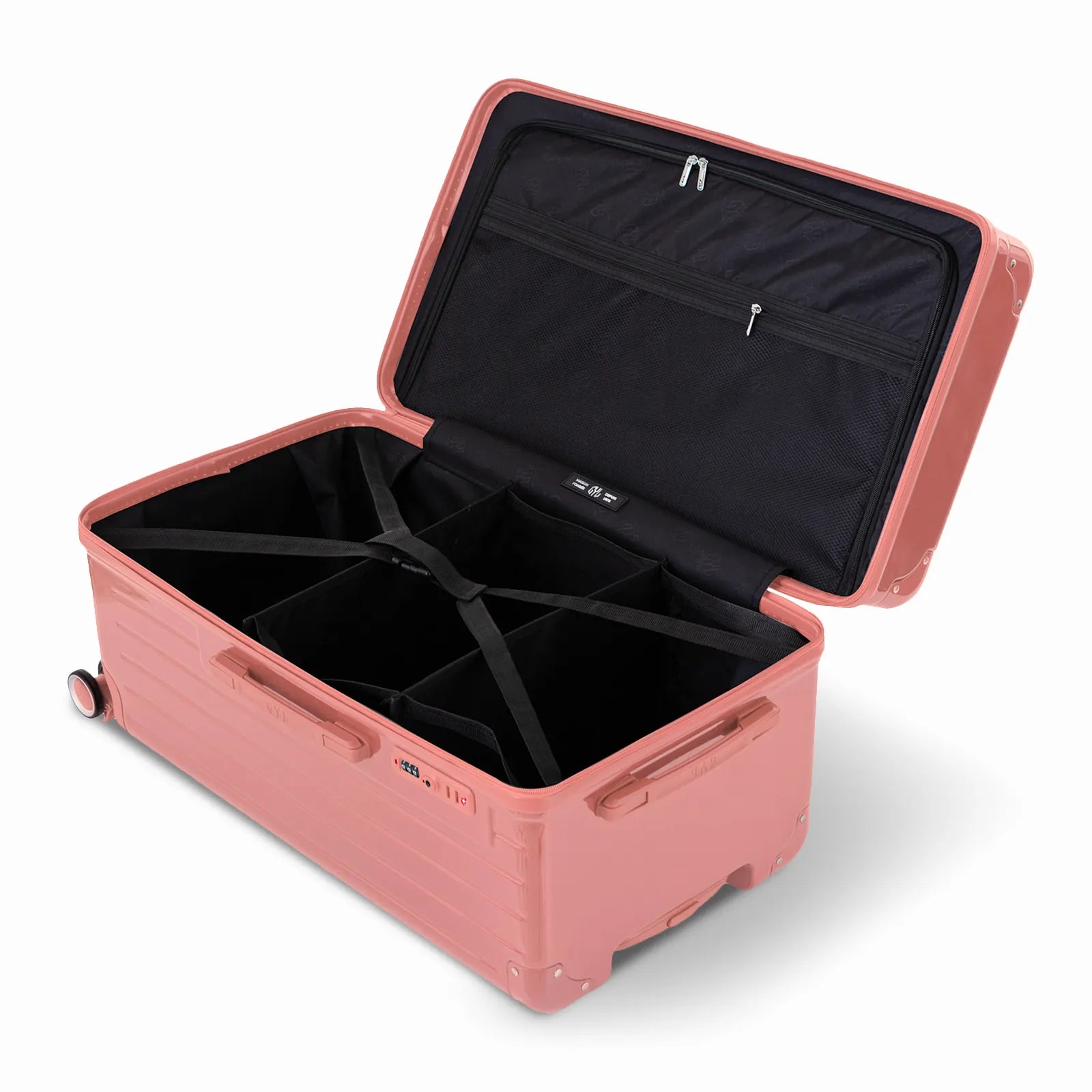 Intérieur de la valise trunk GYL L rose gold ouvert, avec sangles croisées et compartiments de rangement