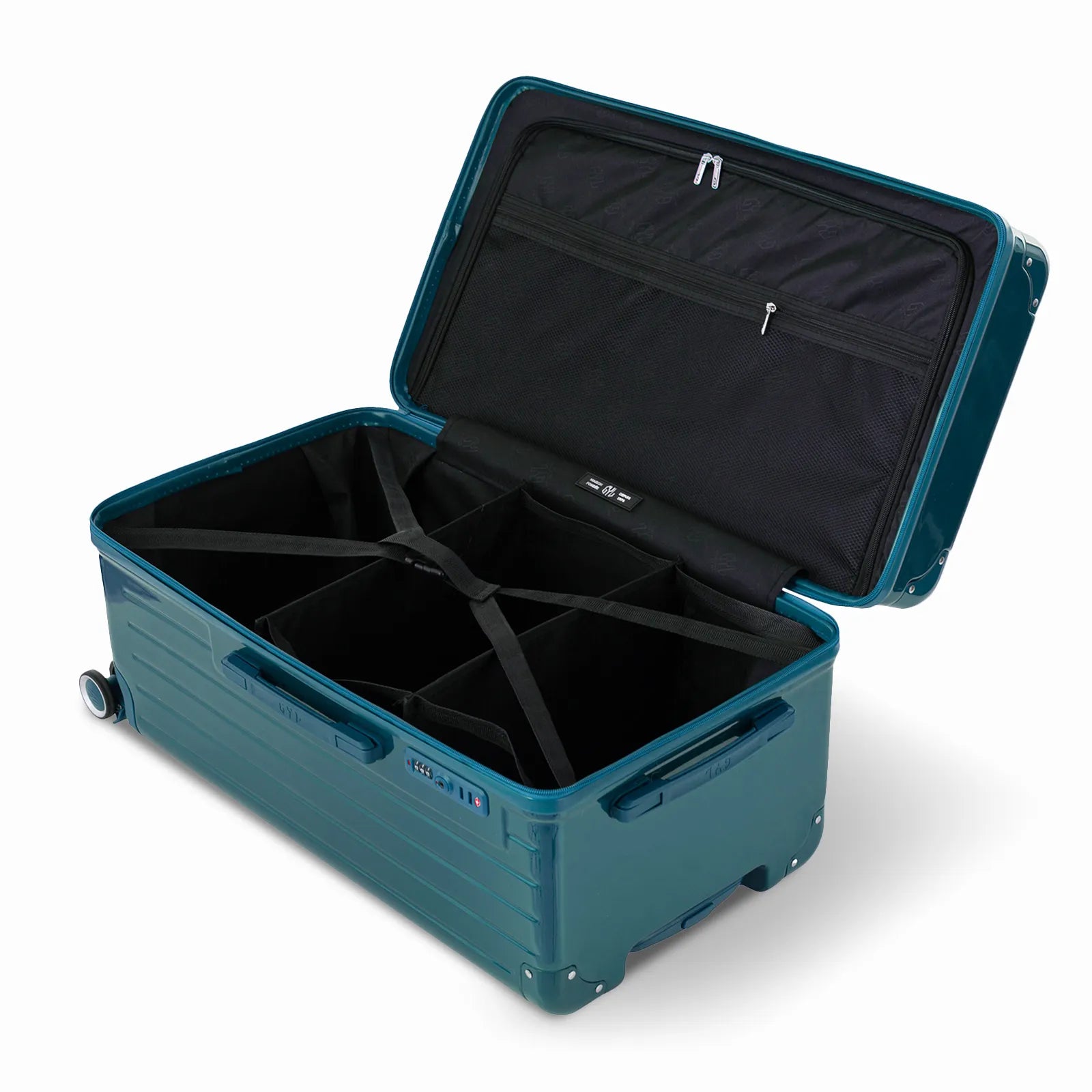 Intérieur de la valise trunk GYL L sapin ouvert, avec sangles croisées et compartiments de rangement